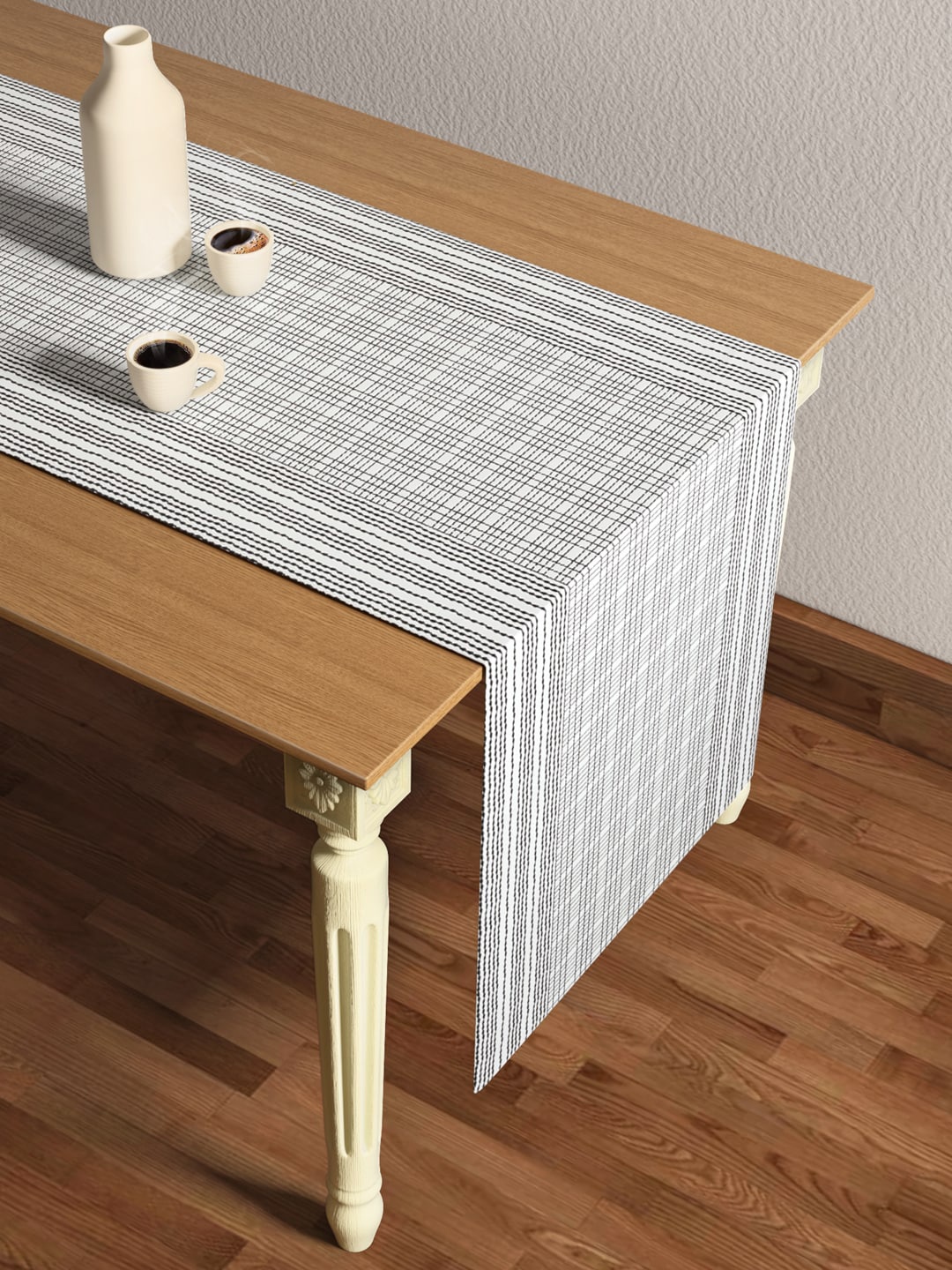 

Living scapes by Pantaloons Off-White & Black Checked Table Runner