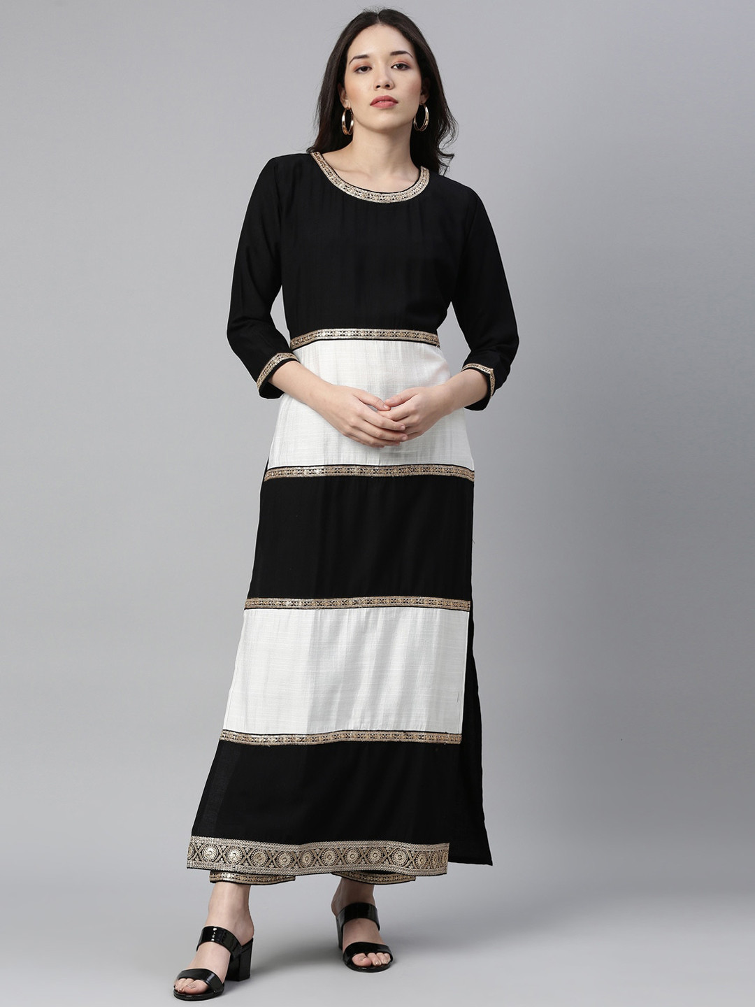 

Neerus Women Black Colourblocked Tiered Sequinned Kurta with Palazzos