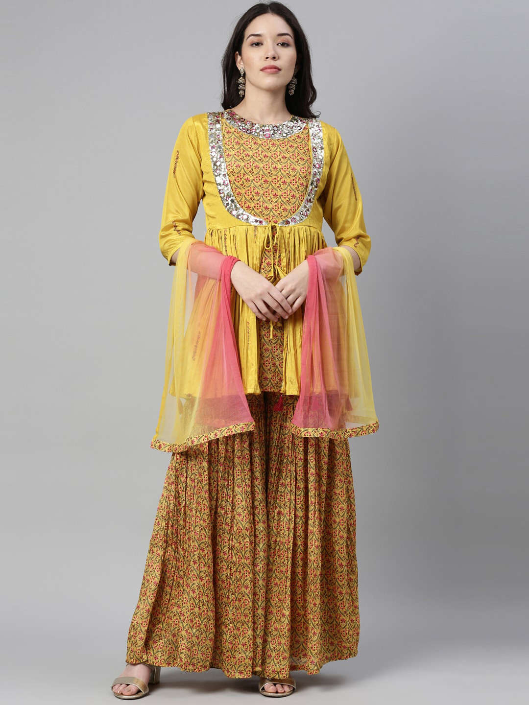 

Neerus Women Mustard Yellow Embroidered Pleated Mirror Work Kurti with Skirt & With Dupatta