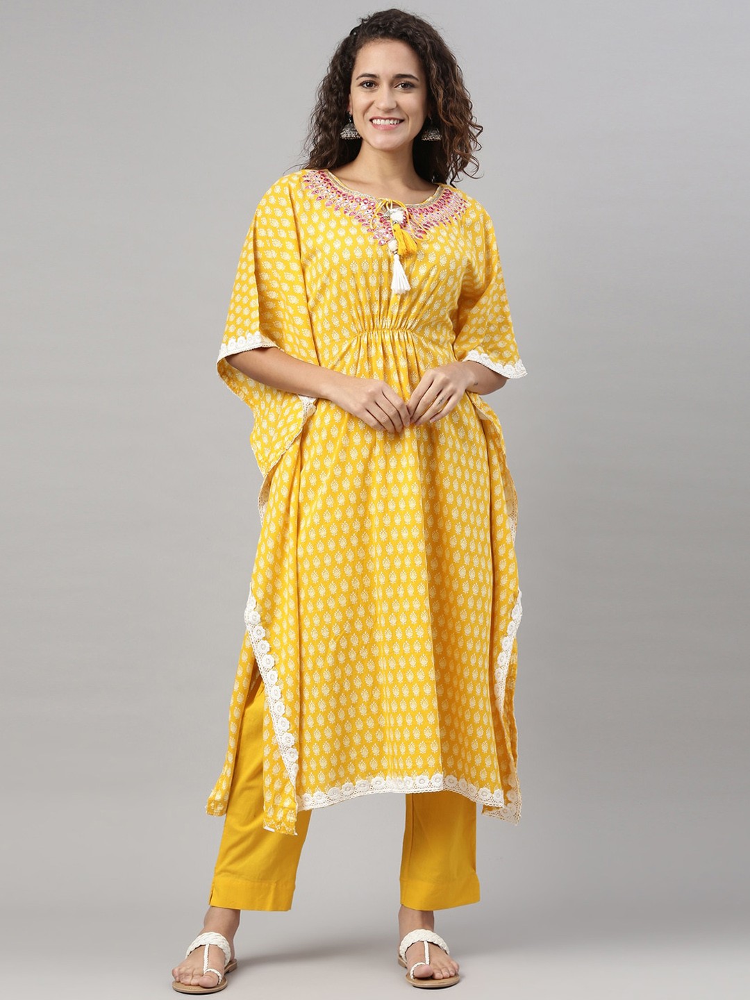 

Neerus Women Mustard Yellow Ethnic Motifs Printed Mirror Work Kaftan Kurta with Trousers