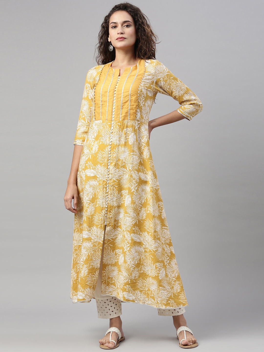 

Neerus Women Mustard Yellow Yoke Design Empire Gotta Patti Kurta with Trousers