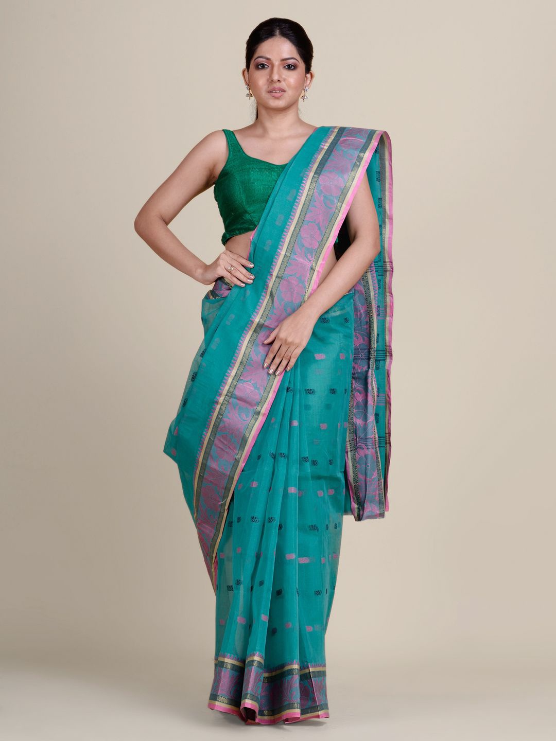 

Charukriti Green & Pink Ethnic Motifs Pure Cotton Taant Saree