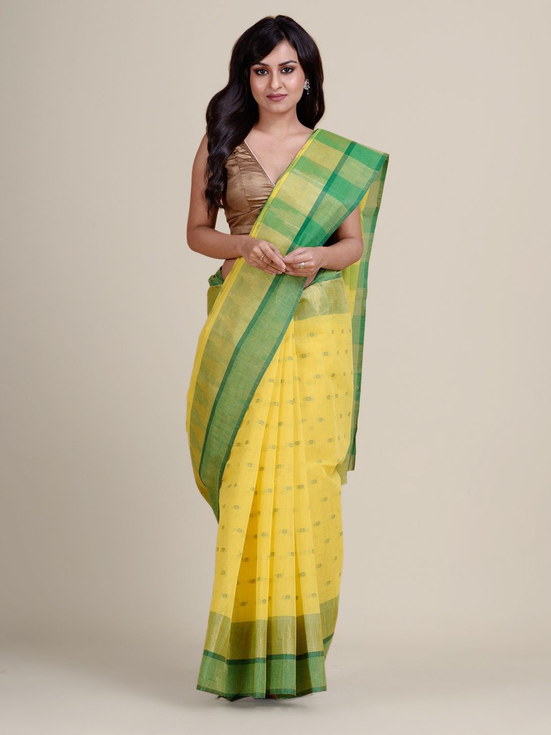 

Charukriti Yellow & Green Striped Pure Cotton Taant Saree