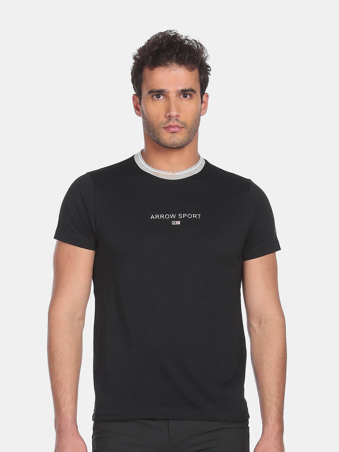 

Arrow Sport Men Black Typography T-shirt