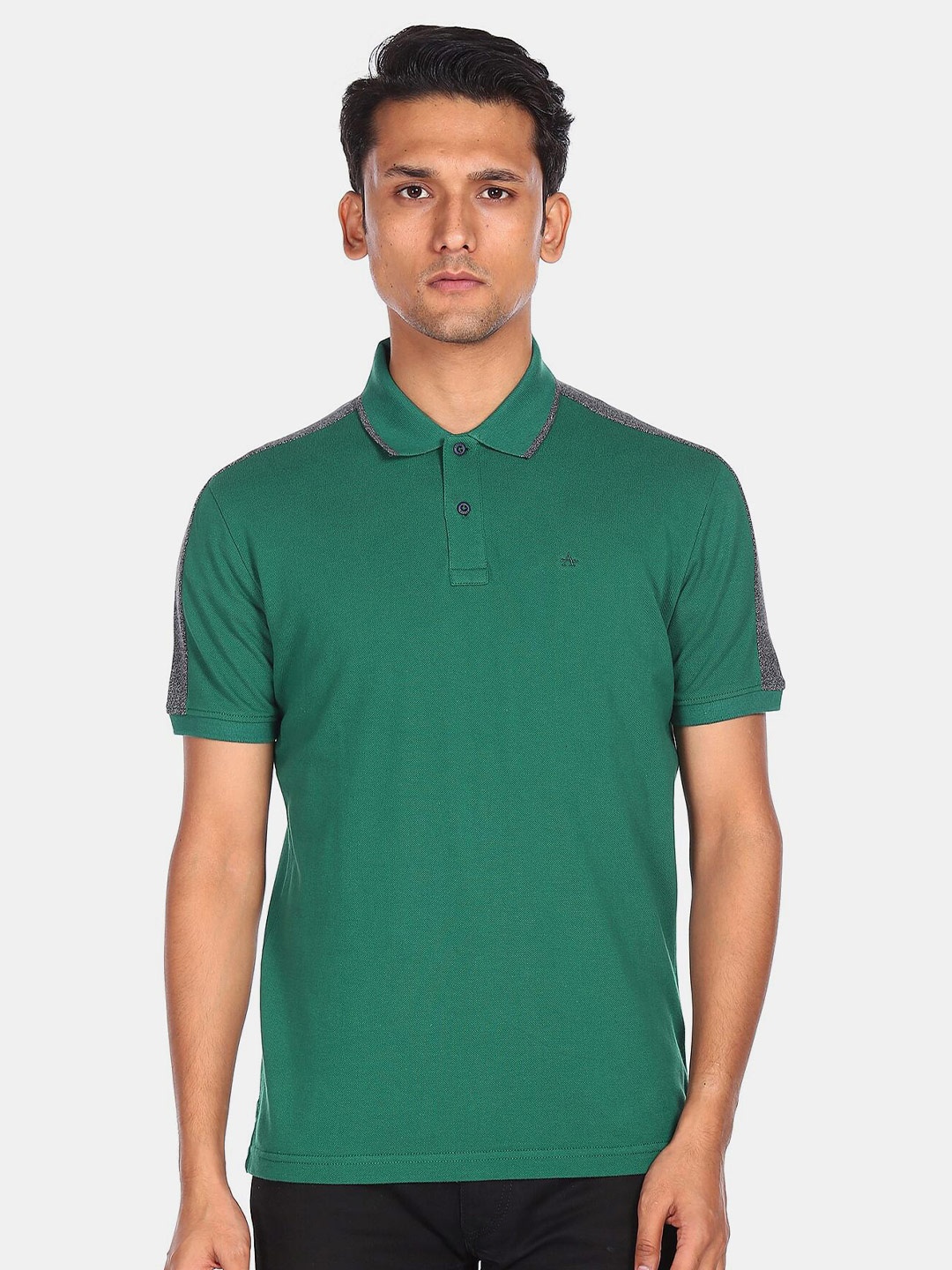 

Arrow Sport Men Green Solid Polo Collar T-shirt