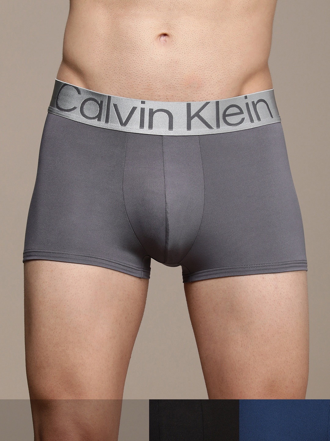 

Calvin Klein Underwear Men Black Grey & Blue Pack of 3 LOW RISE TRUNK