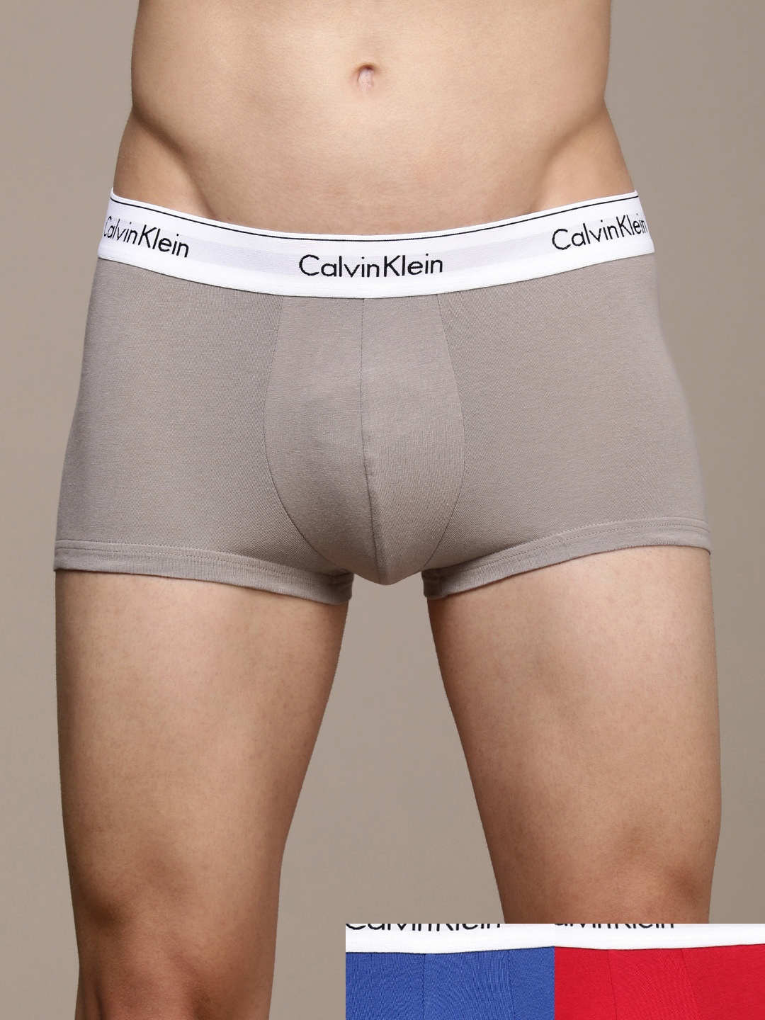 

Calvin Klein Underwear Men Pack of 3 Solid Trunks, Grey