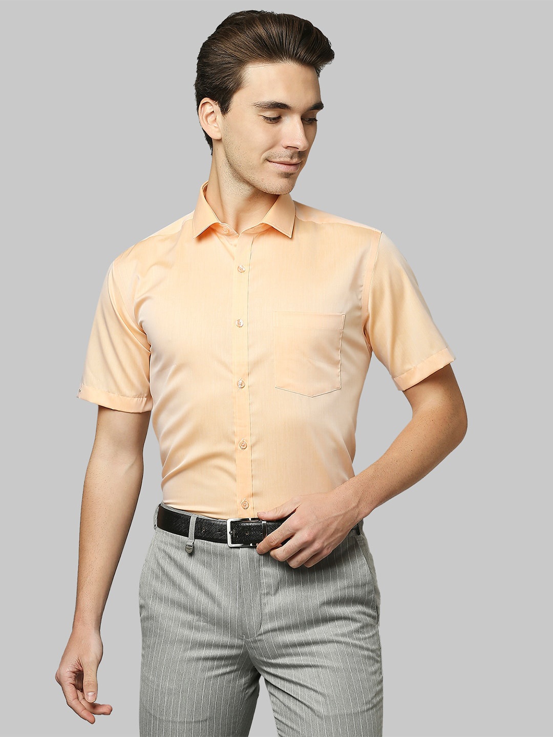

Park Avenue Men Orange Solid Formal Shirt
