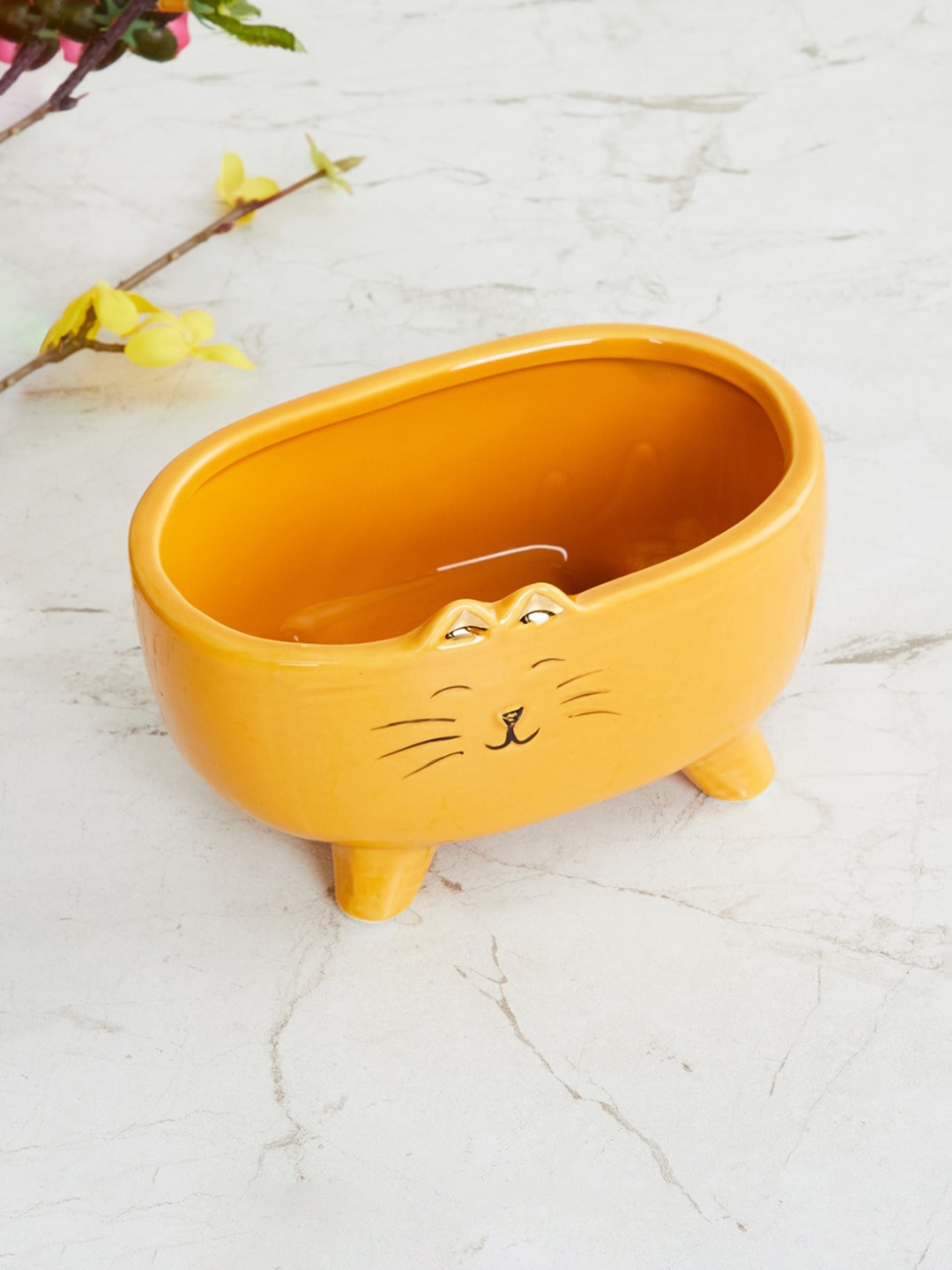 

Home Centre Yellow Printed Ceramic Planter