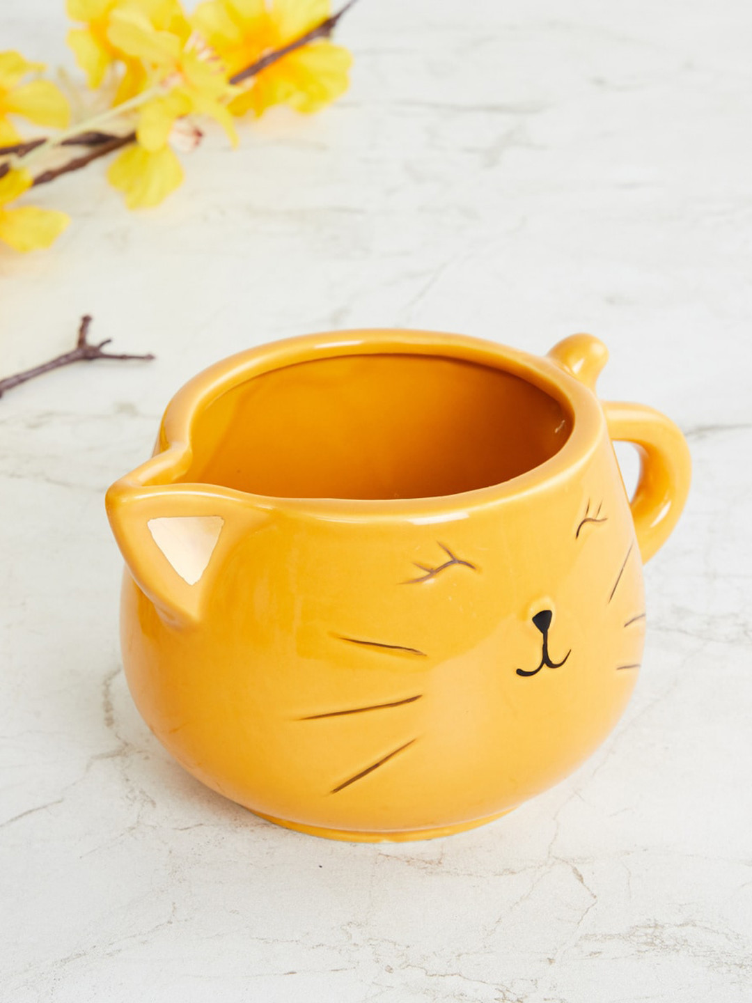 

Home Centre Yellow Printed Ceramic Planter