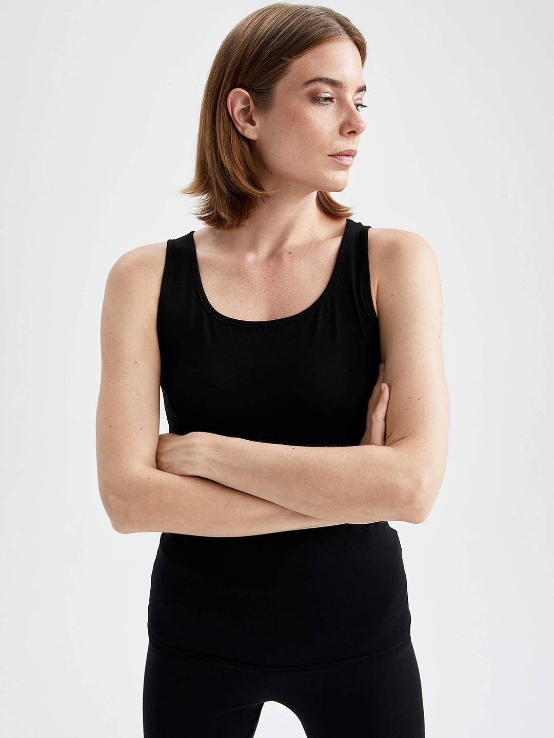 

DeFacto Women Black Solid Tank Top