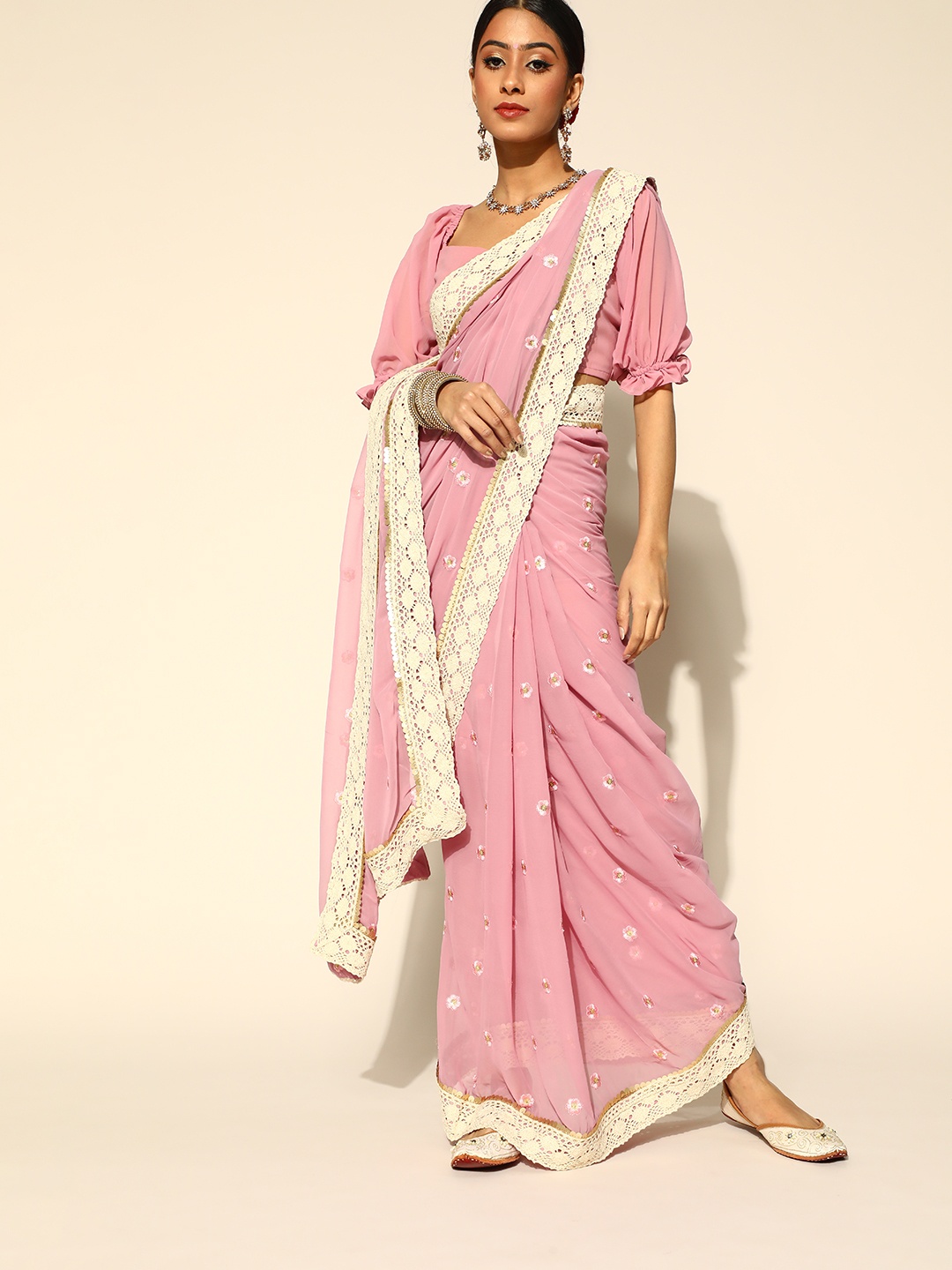 

Inddus Women Pink Floral Embroidered Saree