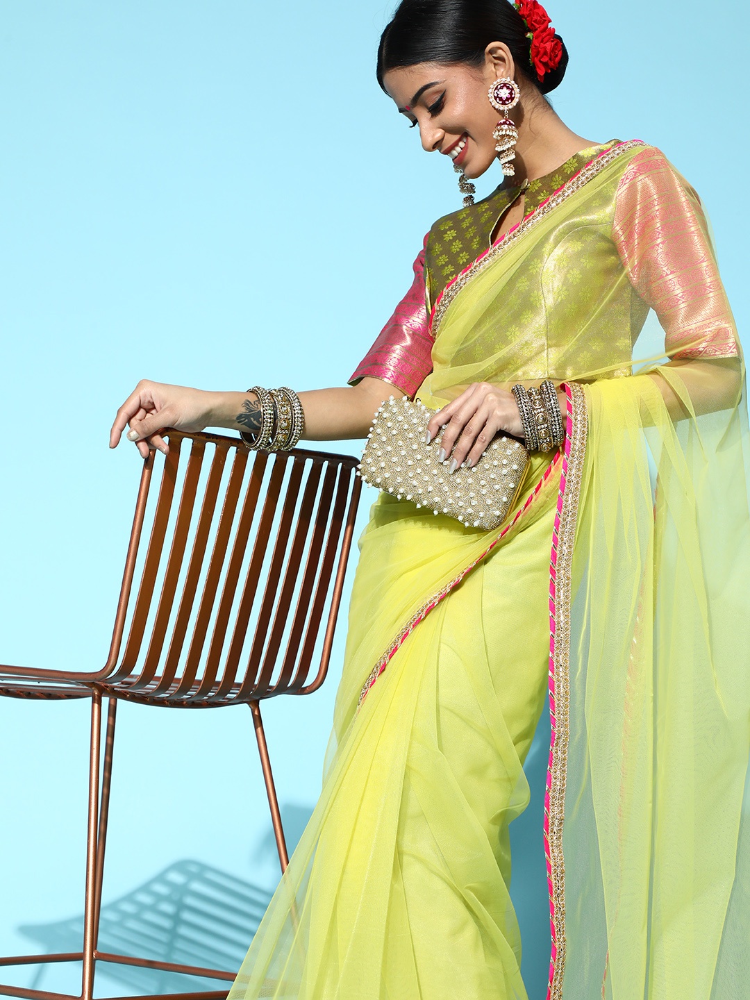 

Inddus solid net saree with embellished border and woven blouse piece, Lime green