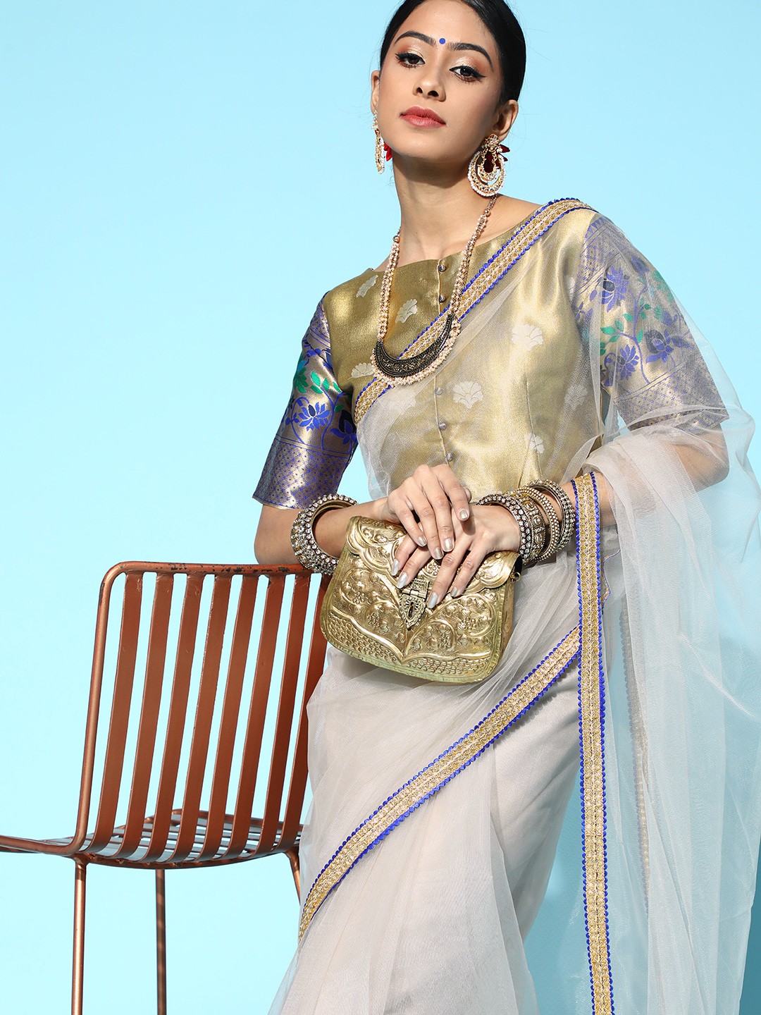 

Inddus Solid Net Saree With Zari Border And Brocade Blouse, Grey