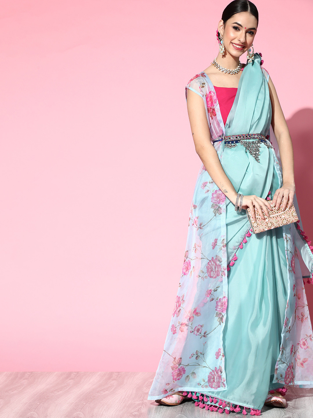 

Inddus Blue solid organza saree with floral printed organza jacket, Turquoise blue