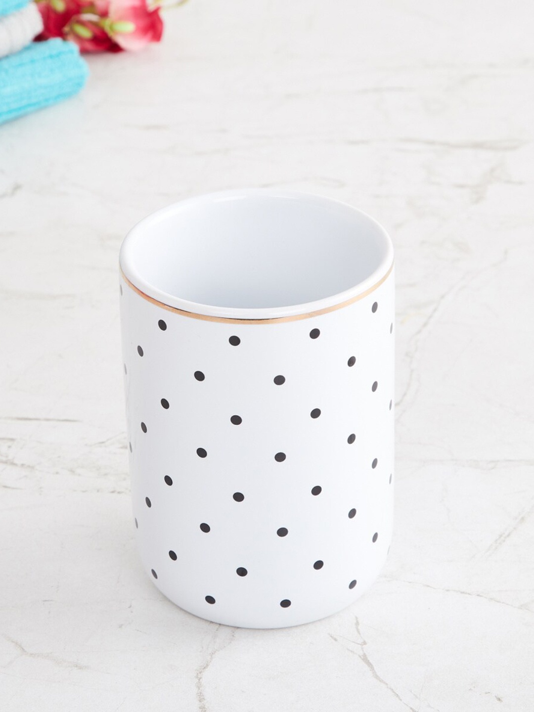 

Home Centre White & Black Toothbrush Holder