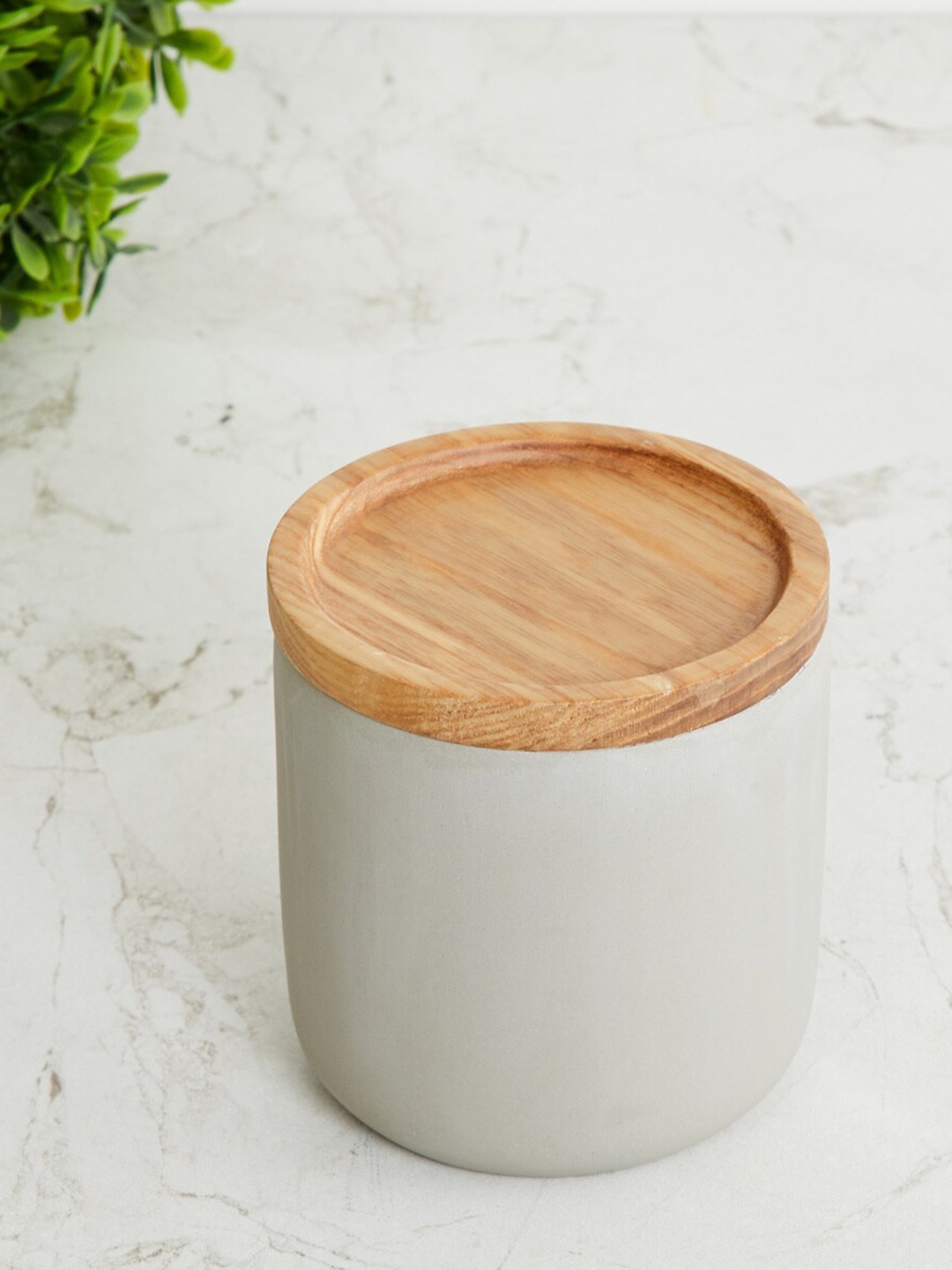 

Home Centre Grey Solid Cement Cotton Jar
