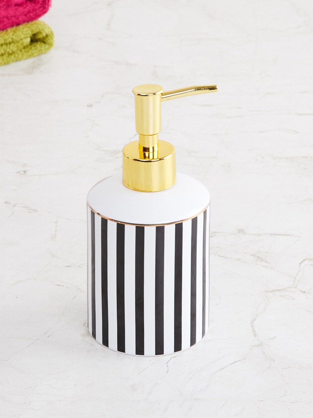 

Home Centre Black & White Striped Ceramic Soap Dispenser