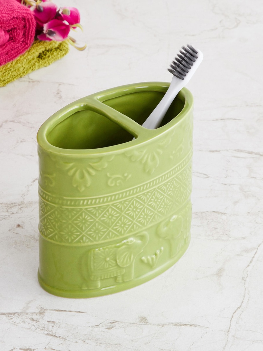 

Home Centre Green Art of Asia-Royal Retreat Elephant Solid Ceramic Toothbrush Holder