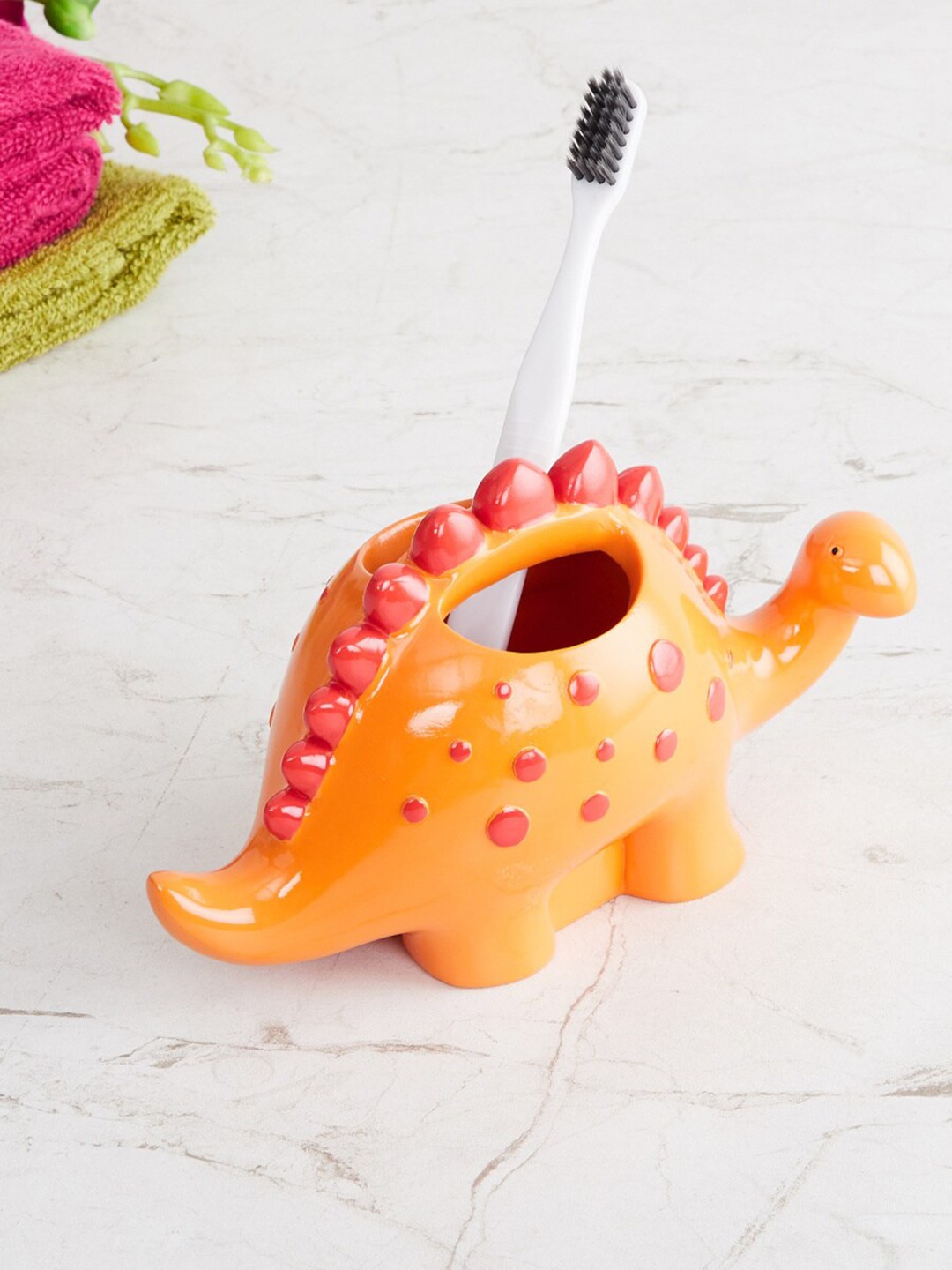 

Home Centre Orange Dinosaur Polyresin Bathroom Tooth Brush Holder