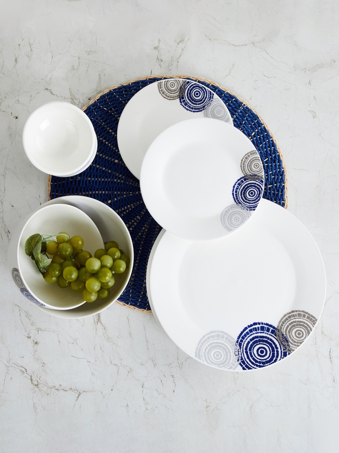 

Home Centre White & Blue 14 Pieces Printed Porcelain Glossy Dinner Set