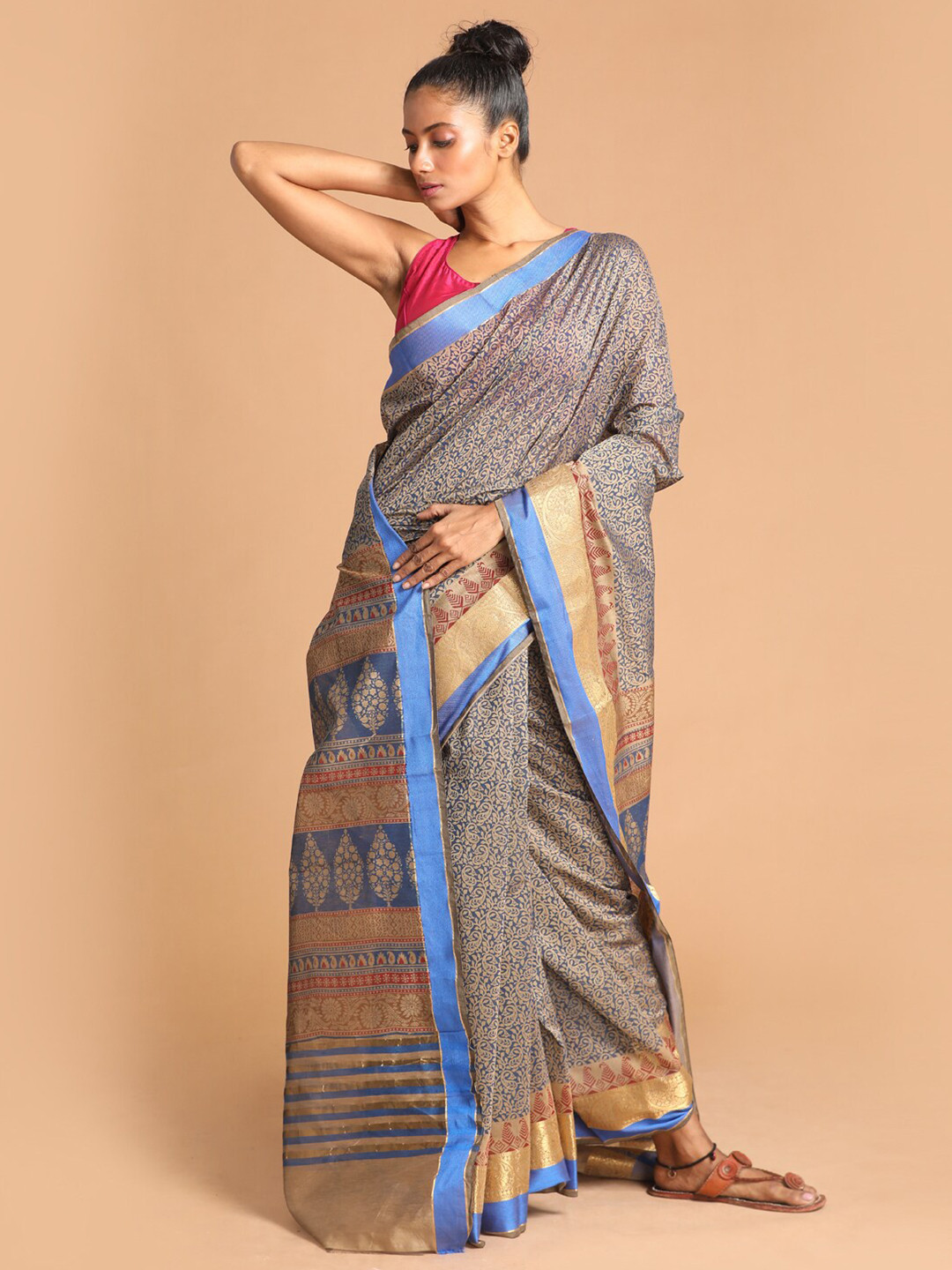 

Indethnic Women Blue Printed Cotton Blend Saree