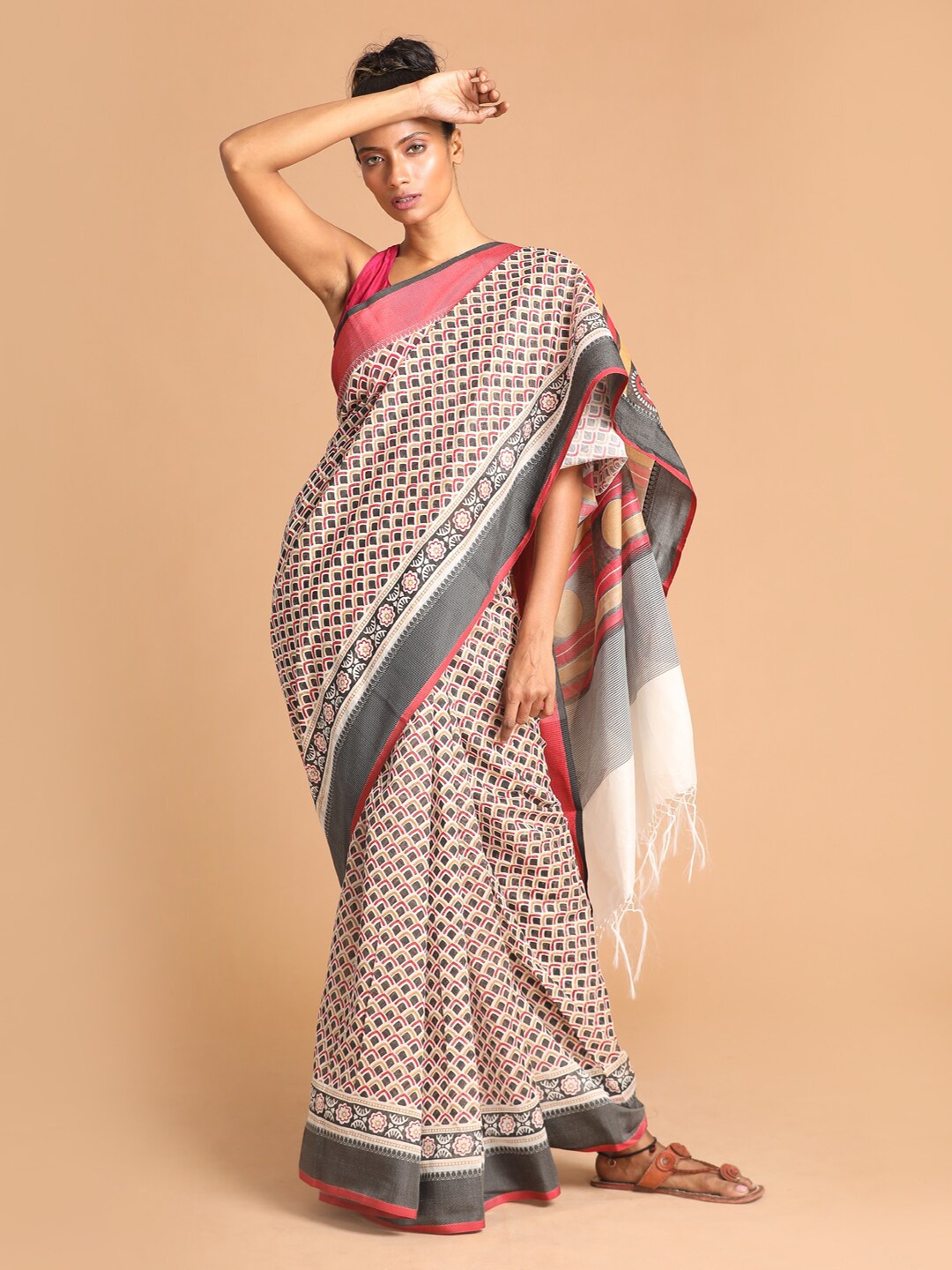 

Indethnic Black & Beige Ethnic Motifs Printed Patola Saree