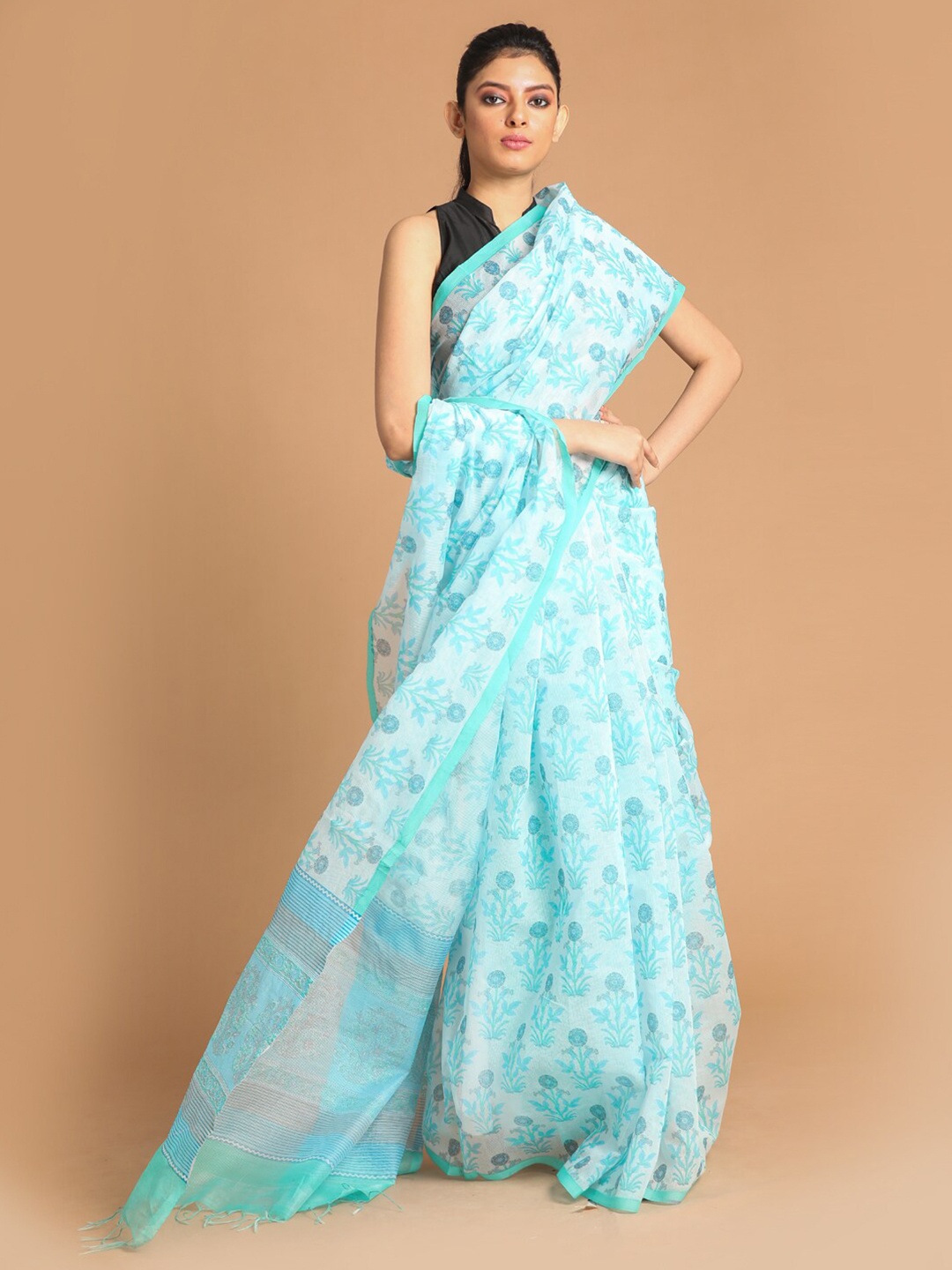 

Indethnic Turquoise Blue Floral Supernet Saree