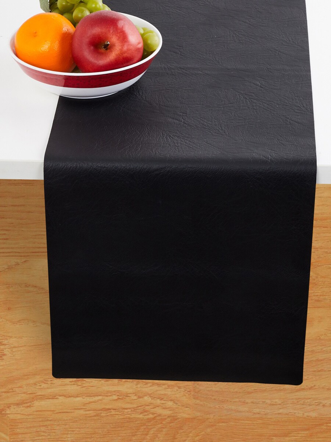 

Home Centre Black Solid Leather Table Runner