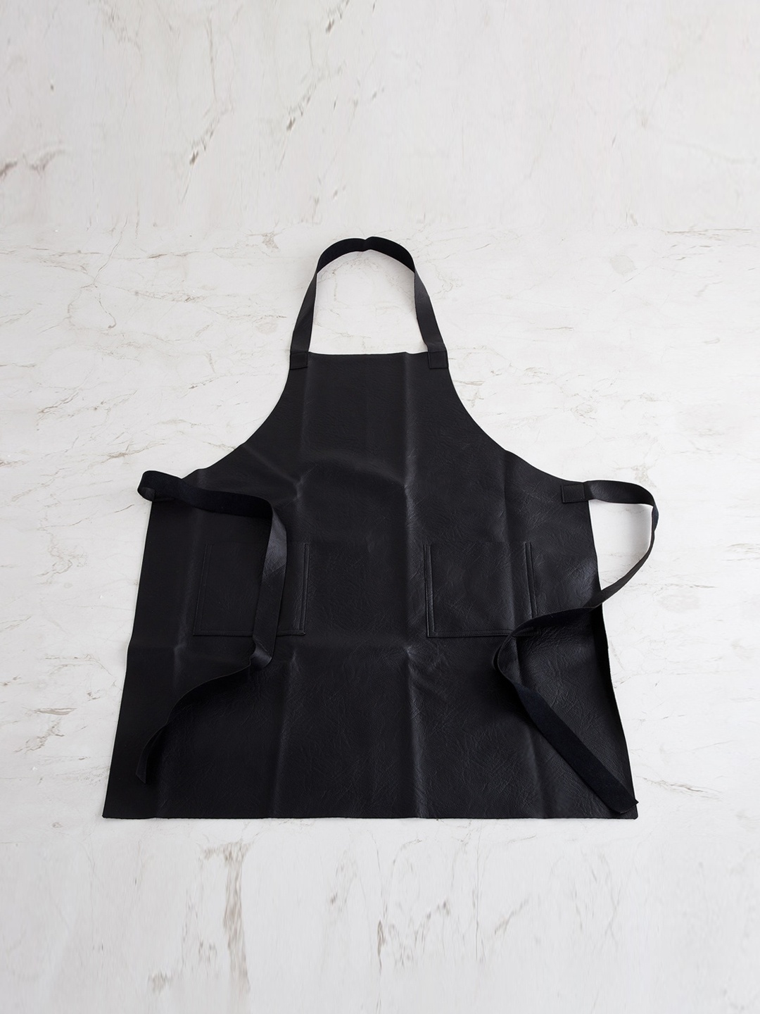 

Home Centre Black Leather Apron