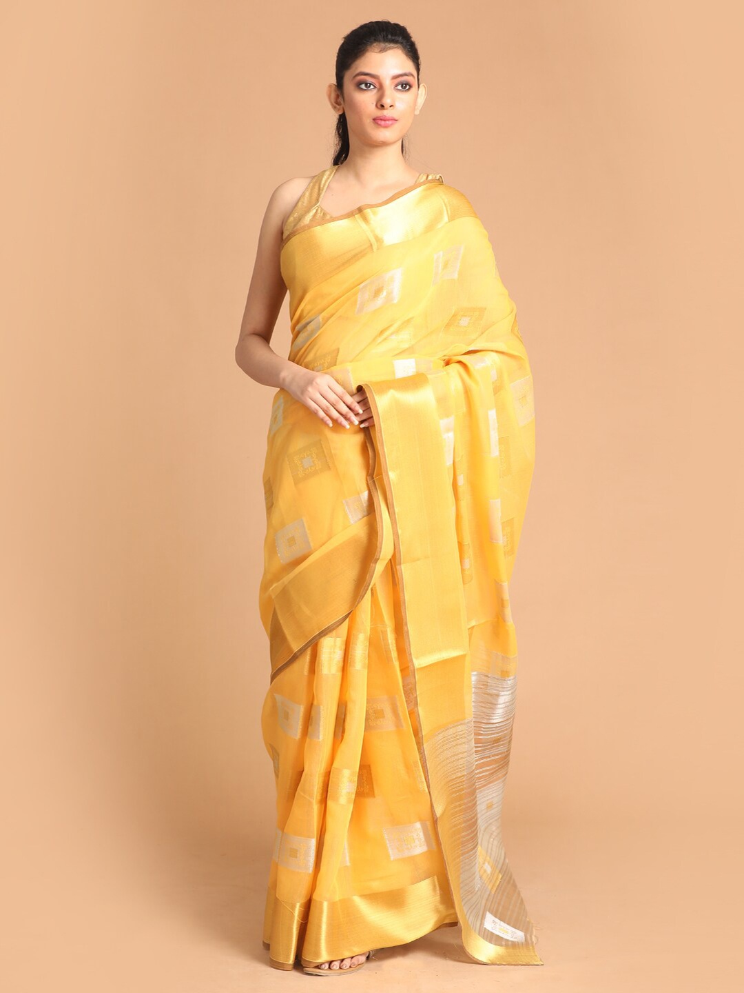 

Saranee Yellow & Tan Ethnic Motifs Saree
