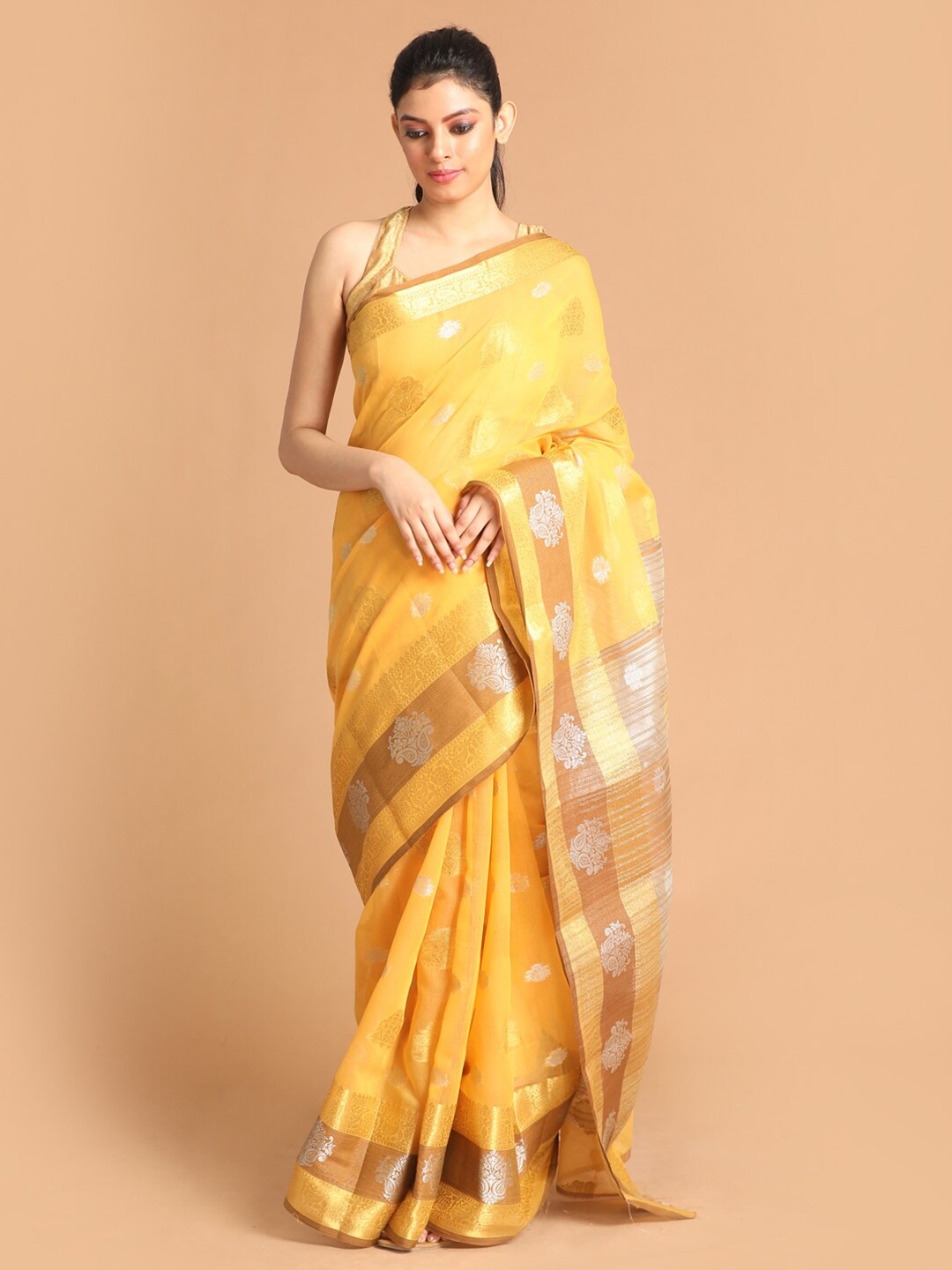 

Saranee Yellow & Silver-Toned Ethnic Motifs Zari Saree