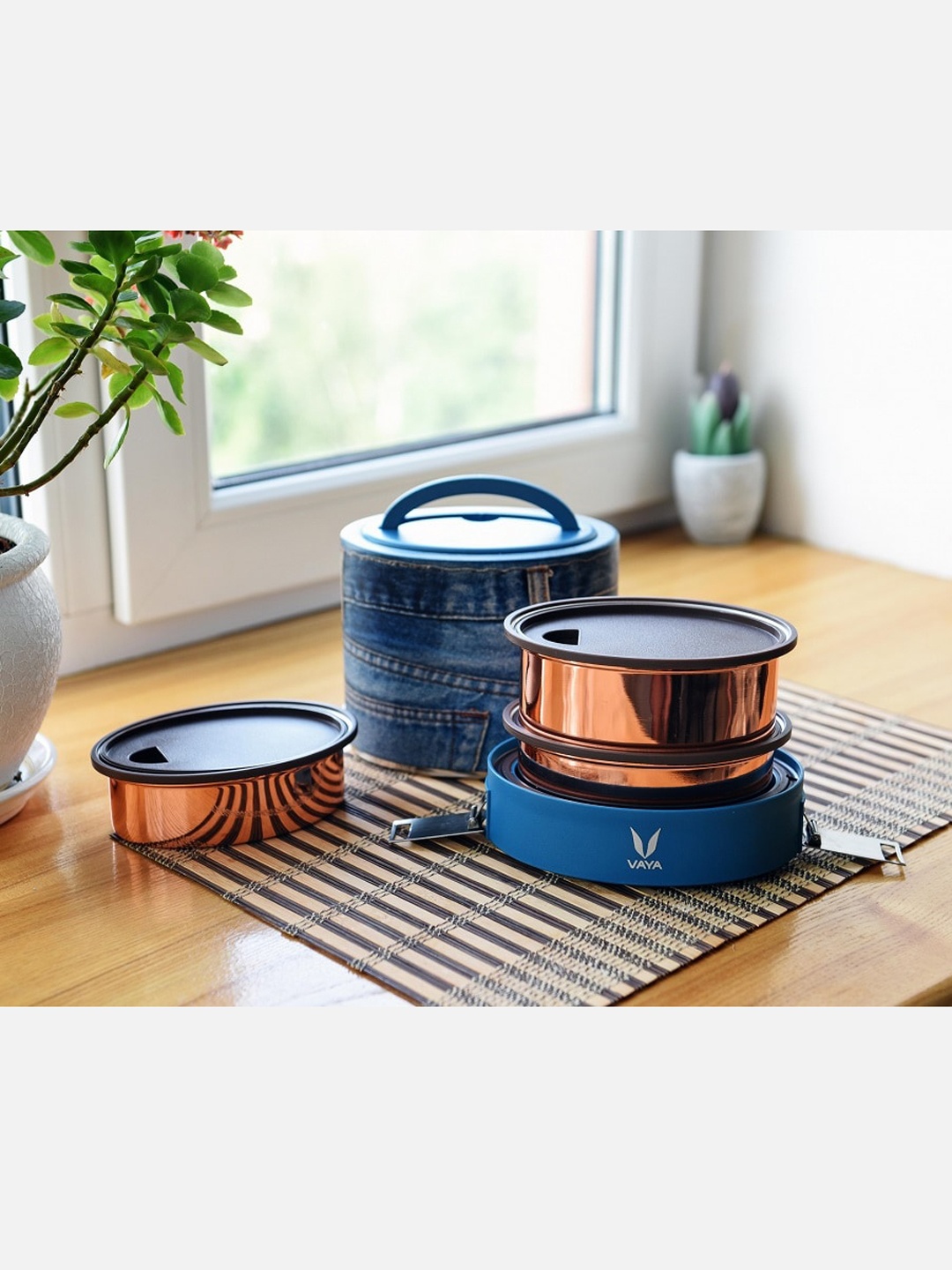 

Vaya Blue Lunch Box with Bagmat & Three Copper Finished Containers 1000ml