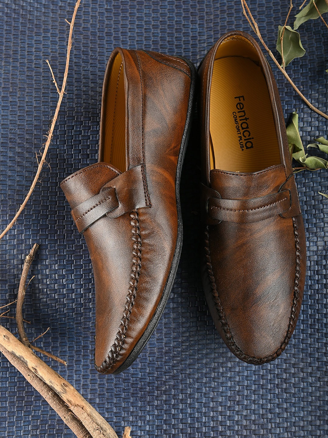 

Fentacia Men Brown Textured Slip On Loafers