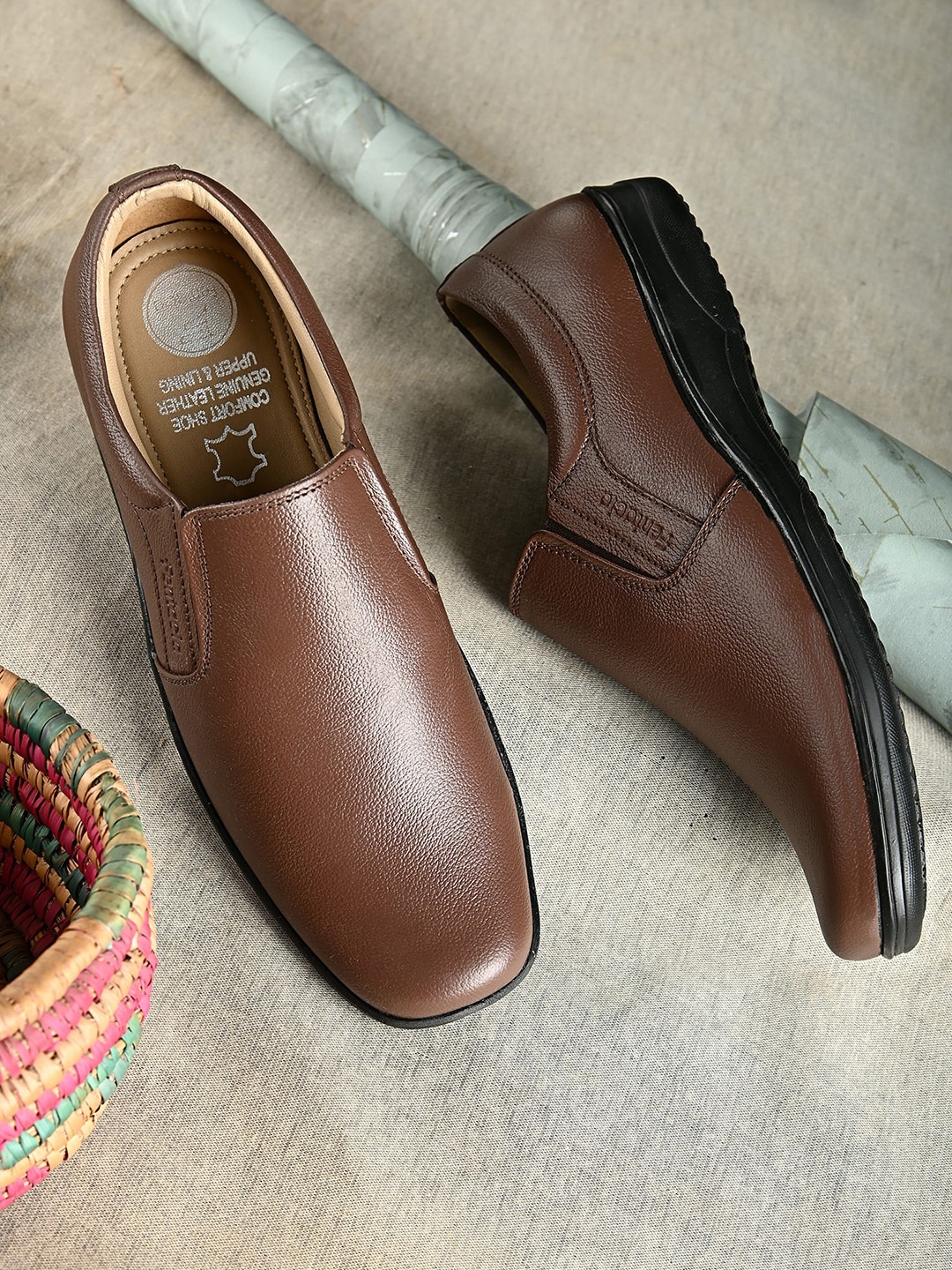 

Fentacia Men Brown Solid Formal Slip Ons