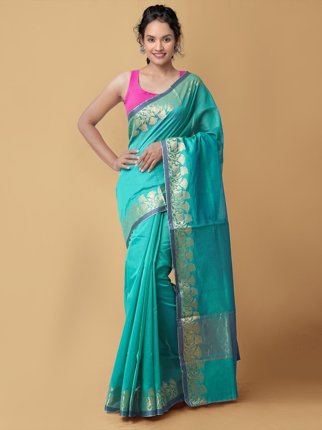 

Unnati Silks Green & Gold-Toned Woven Design Zari Silk Cotton Baluchari Saree