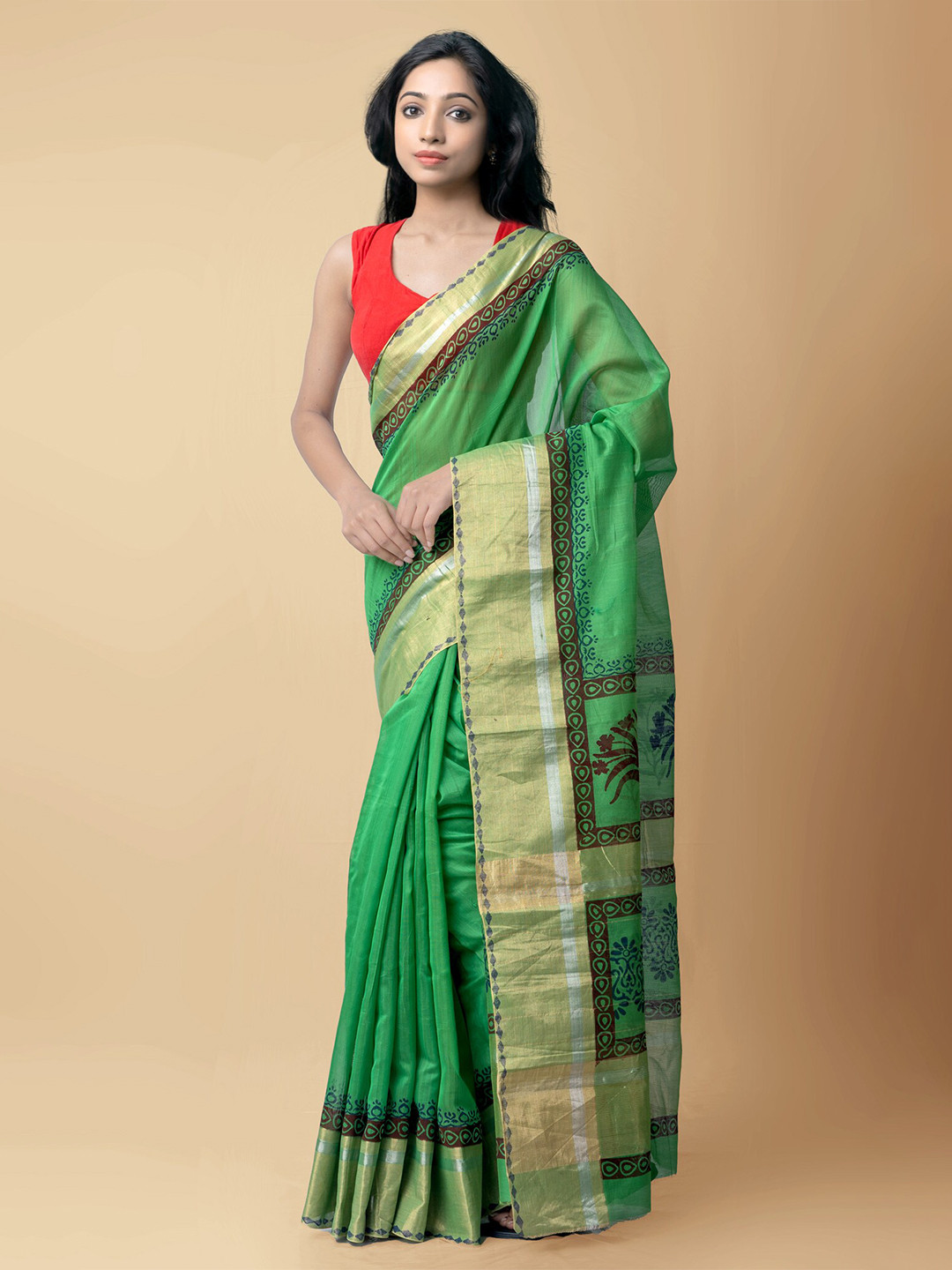 

Unnati Silks Green & Brown Ethnic Motifs Silk Cotton Chanderi Saree