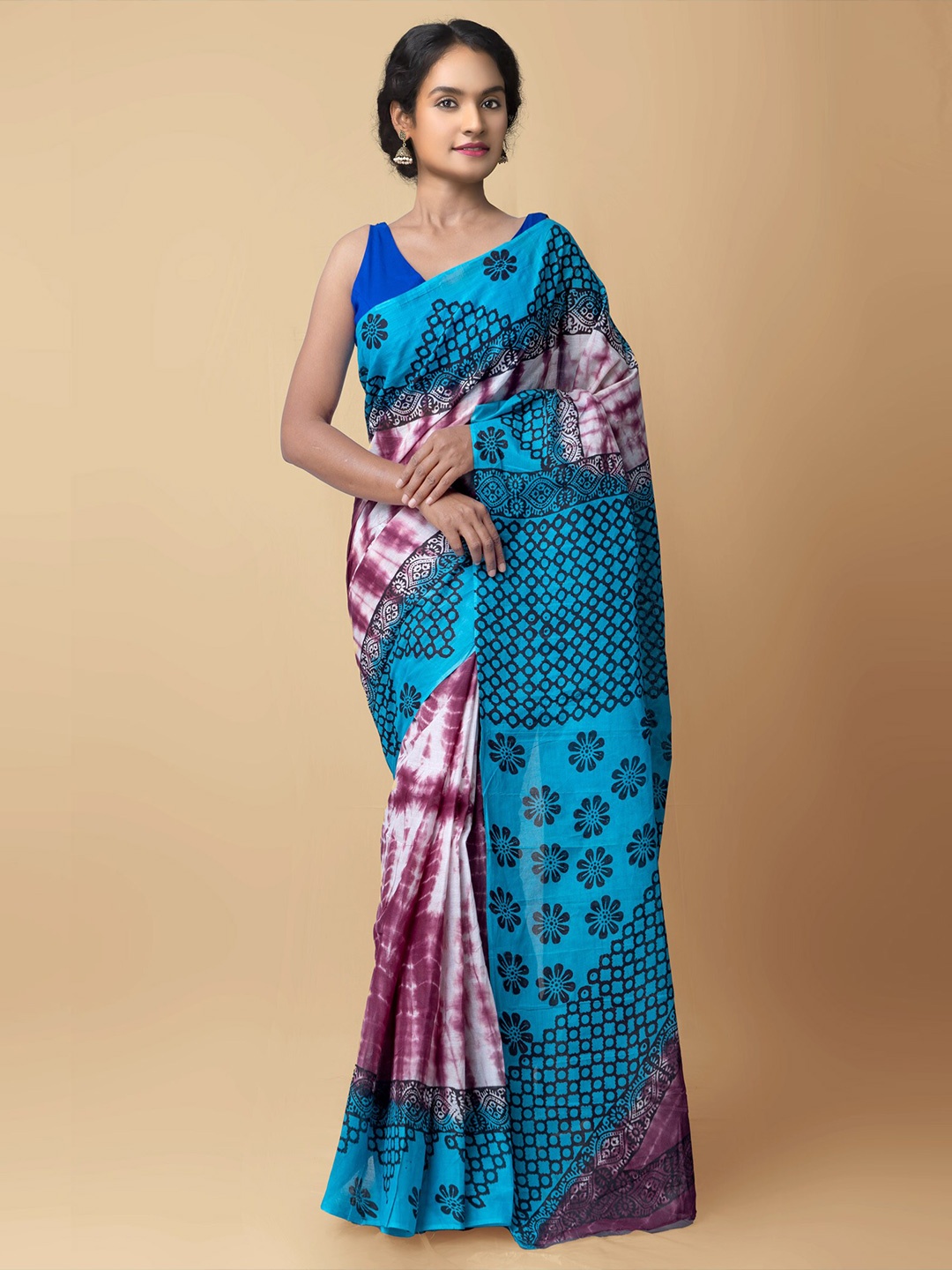 

Unnati Silks Brown & Blue Ethnic Motifs Leheriya Saree