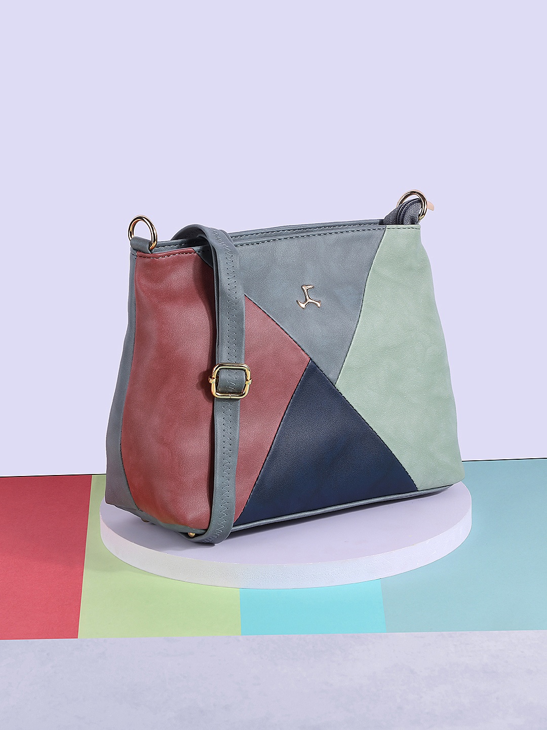 

Mochi Grey Colourblocked PU Structured Sling Bag with Tasselled