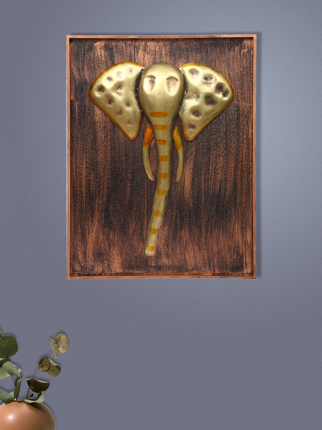 

Aapno Rajasthan Gold-Toned & Brown Ganesha Wall Decor