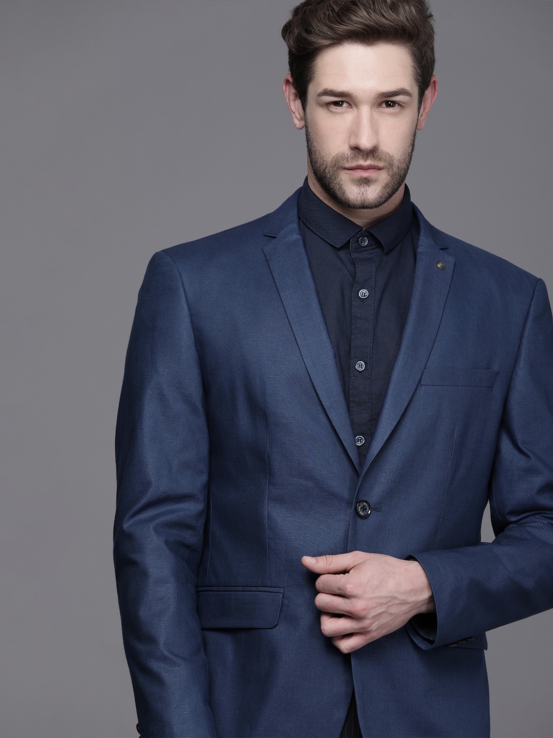 

Allen Solly Men Medium Blue Solid Slim-Fit Single-Breasted Blazer
