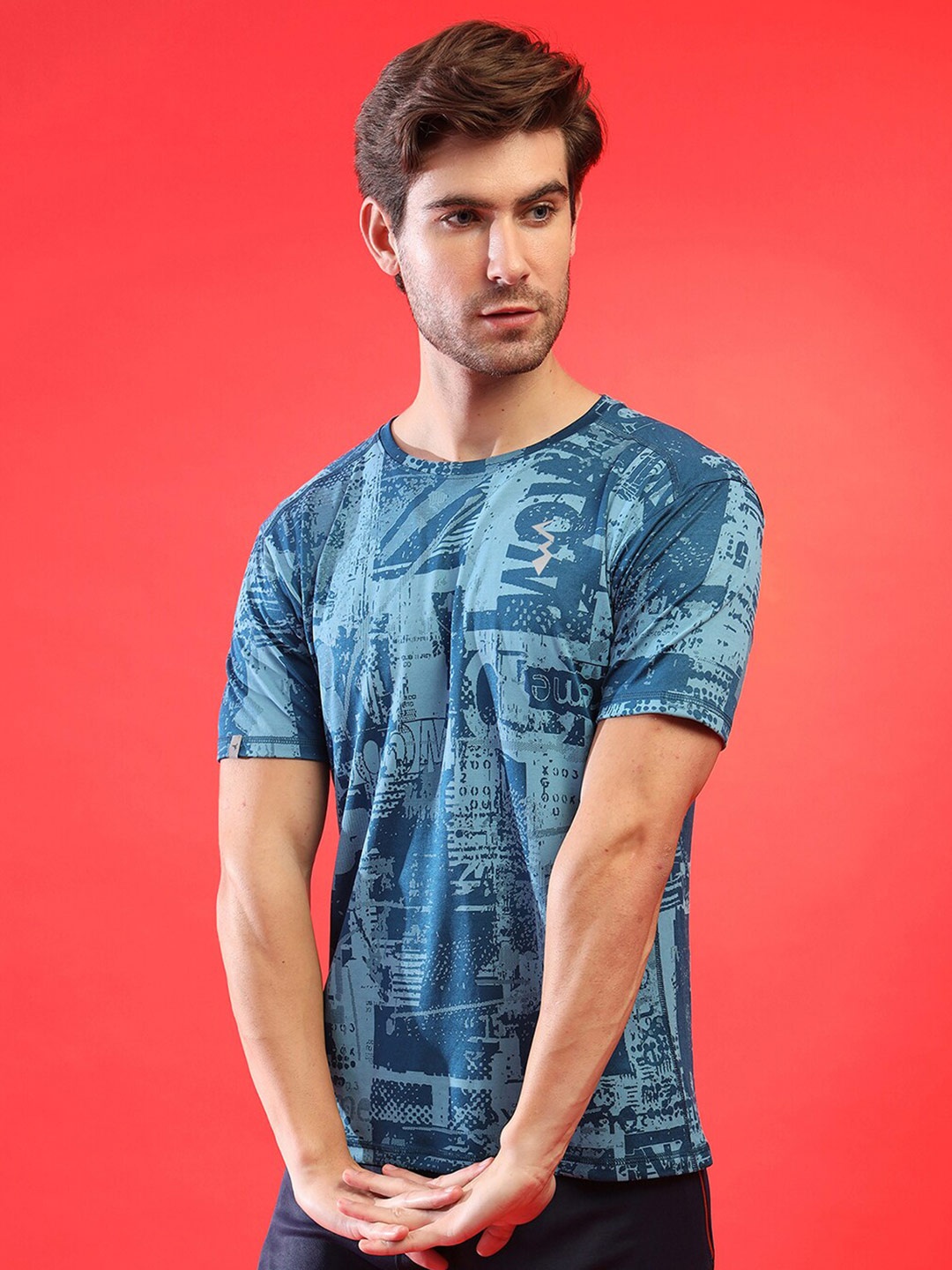 

Campus Sutra Men Teal Dri-FIT Pockets Running T-shirt