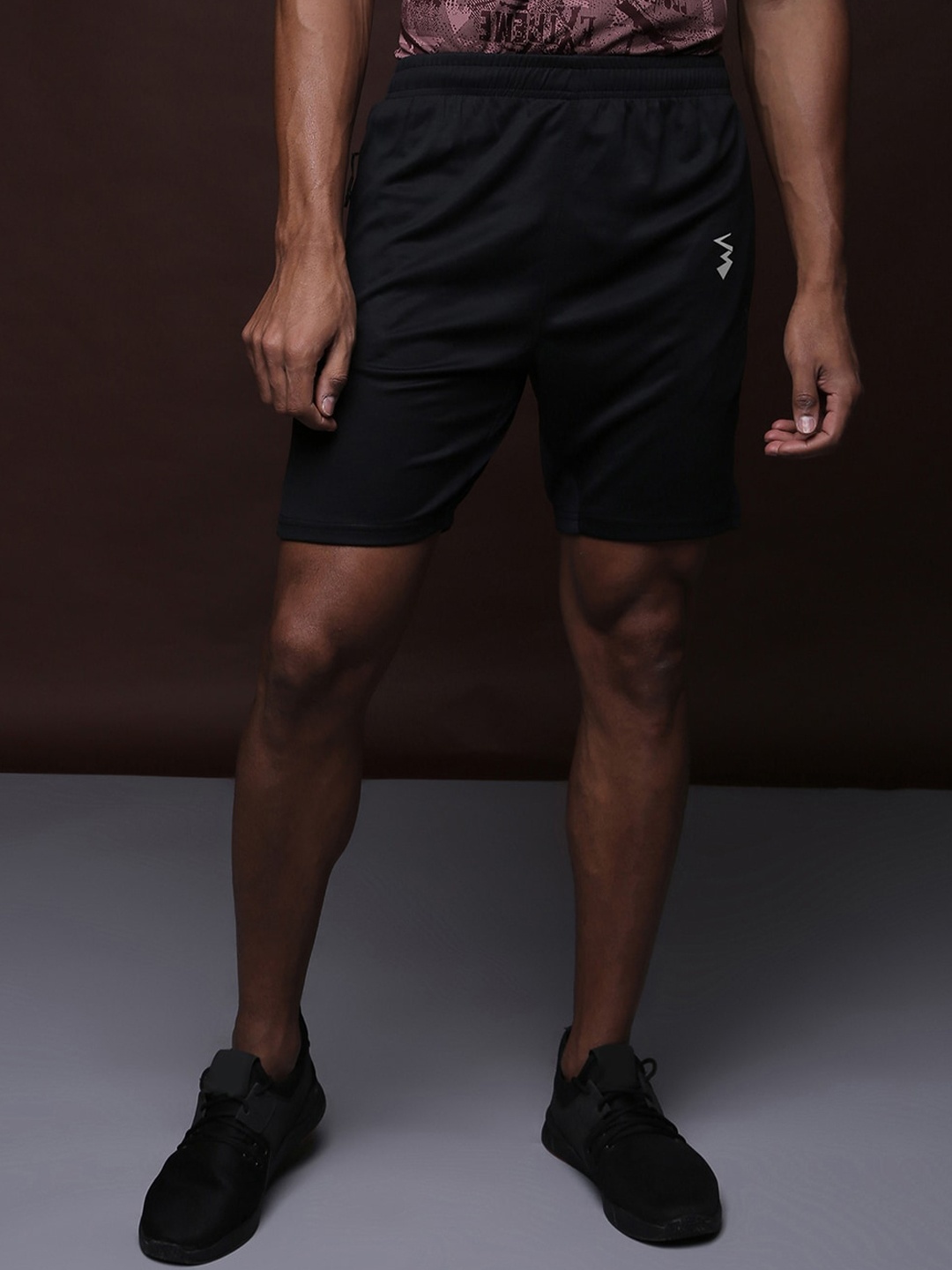 

Campus Sutra Men Black Solid Running Shorts