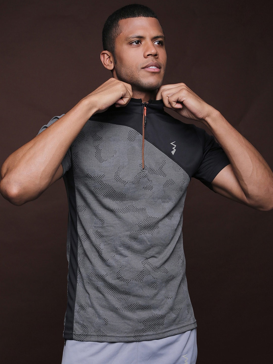 

Campus Sutra Men Black Colourblocked Polo Collar Dri-FIT Pockets Running T-shirt