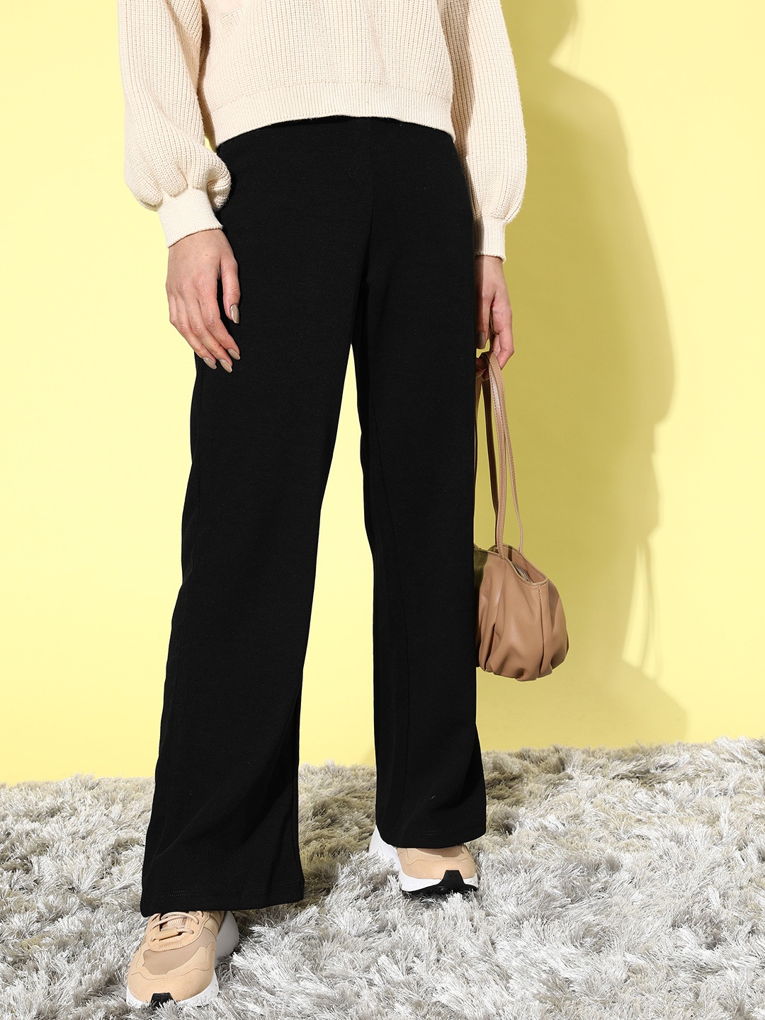 

Tokyo Talkies Women Black Flared High-Rise Trousers