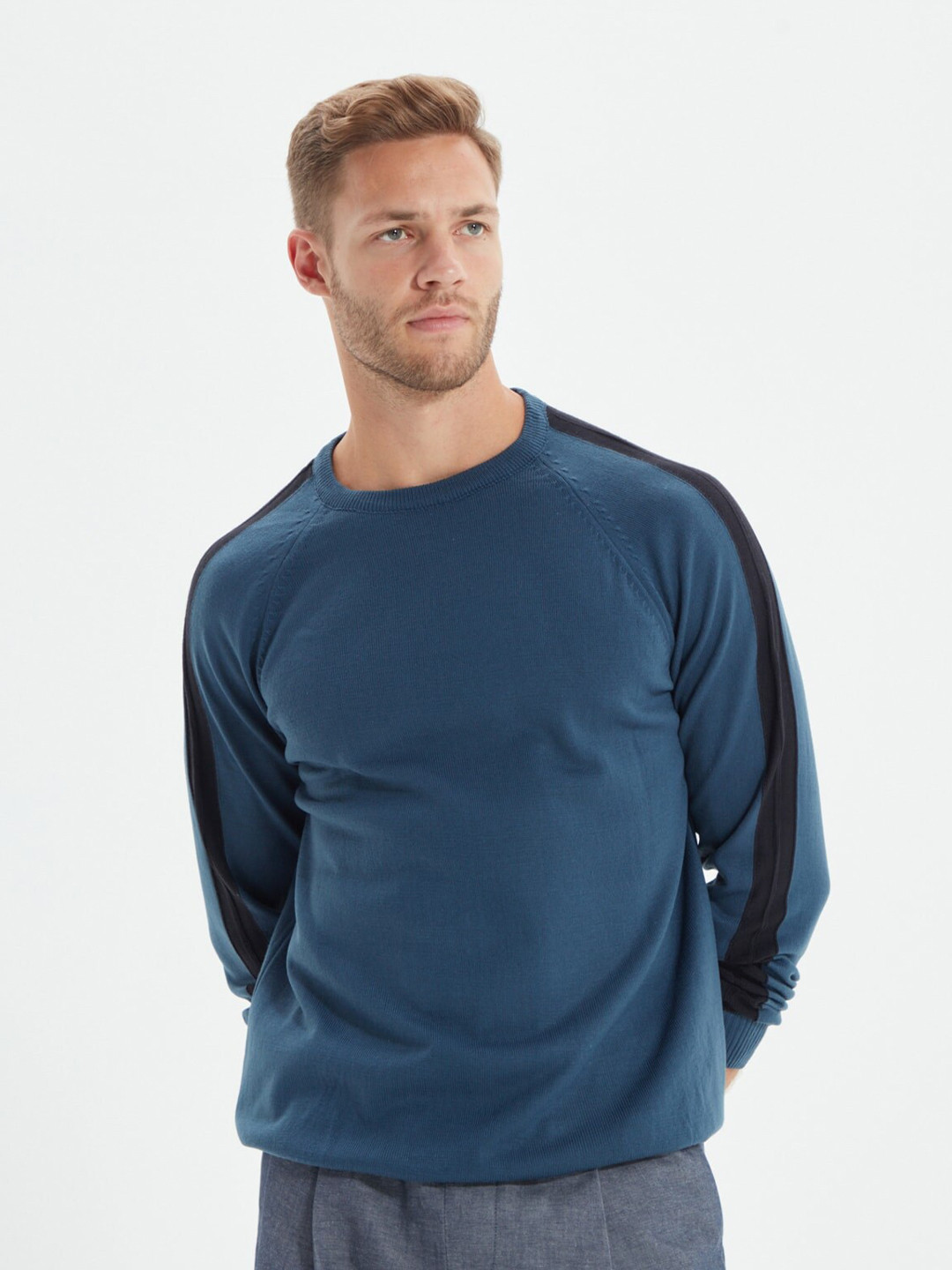 

Trendyol Men Blue Solid Round Neck Sweater