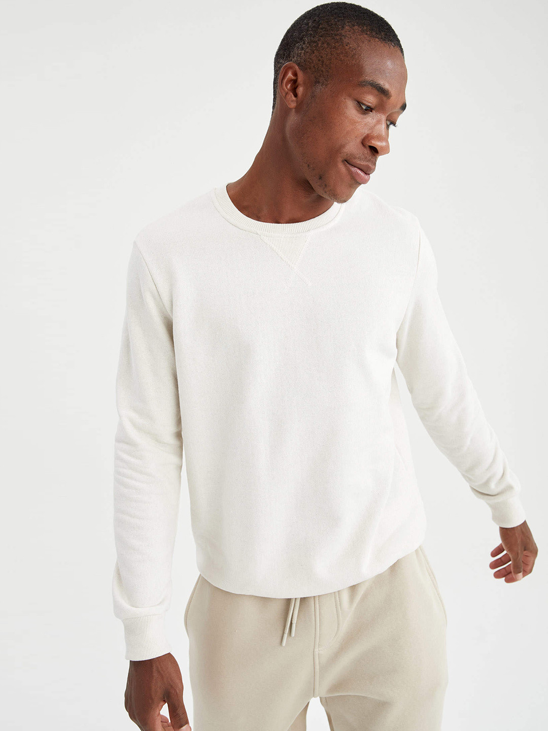 

DeFacto Men Off-White Solid Sweatshirt
