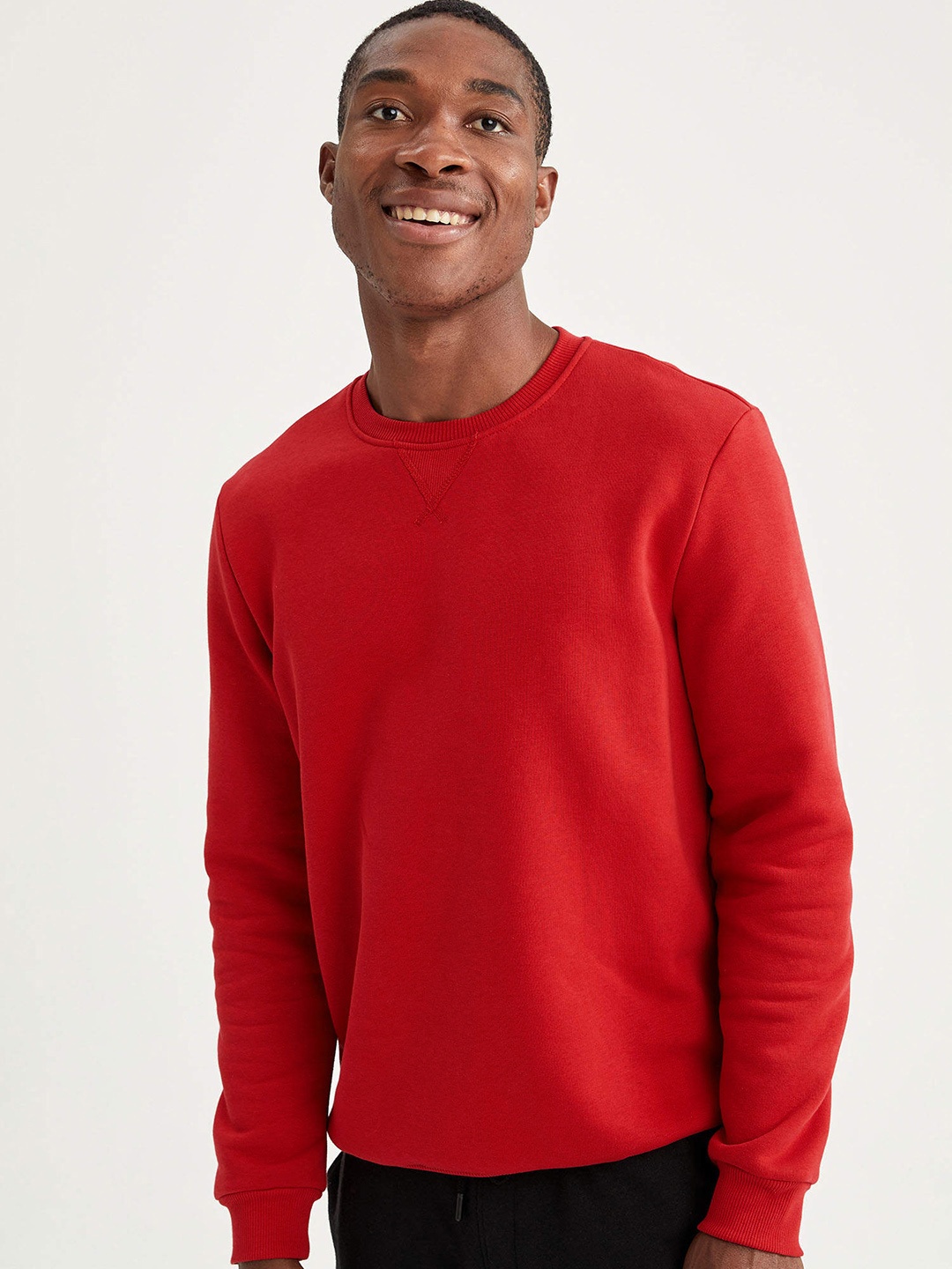 

DeFacto Men Red Solid Sweatshirt