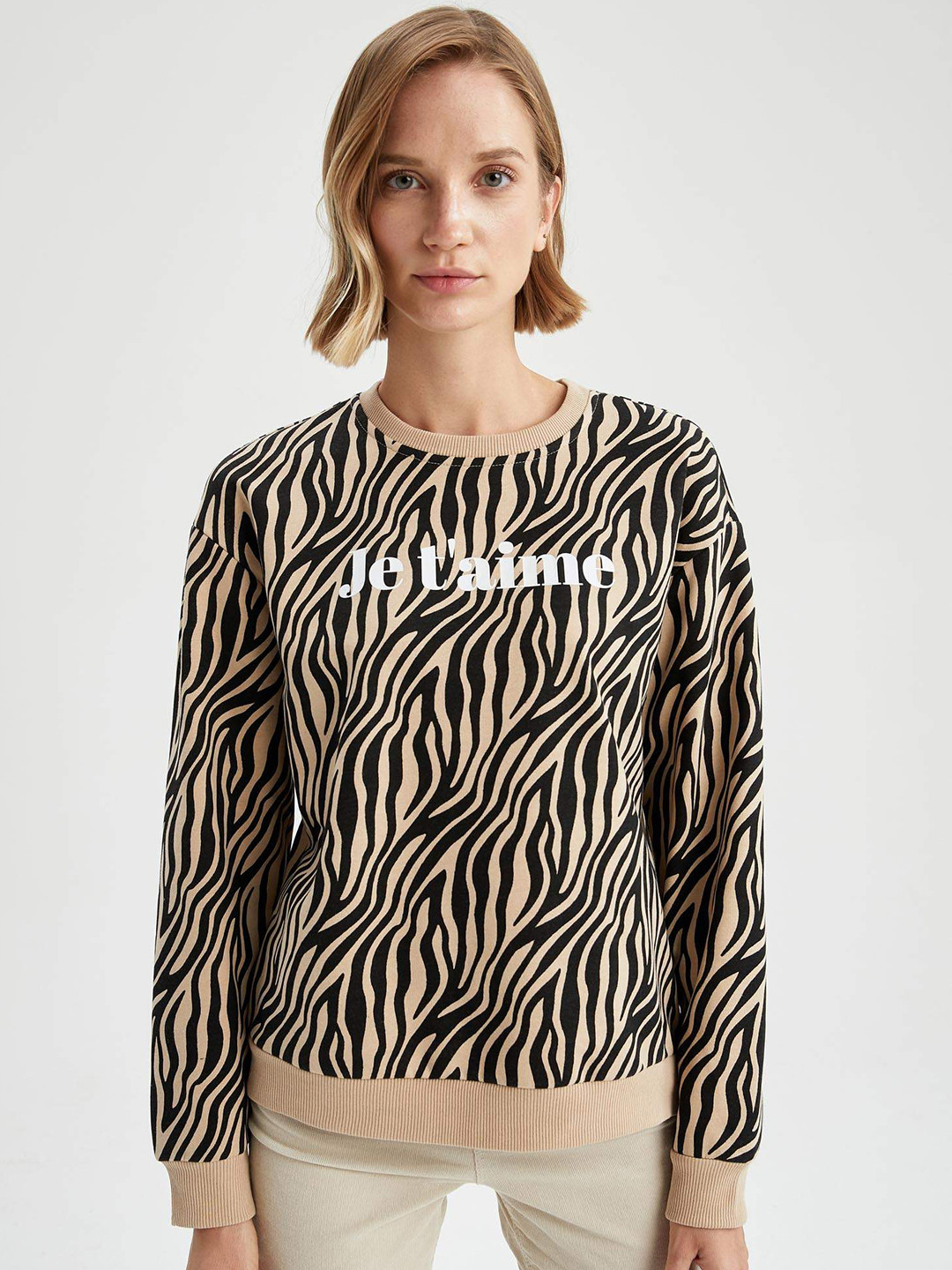 

DeFacto Women Peach-Coloured & Black Abstract Print Sweatshirt