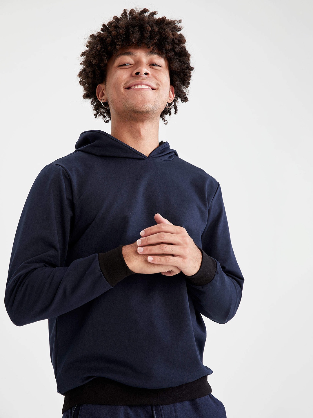 

DeFacto Men Navy Blue Solid Hooded Sweatshirt